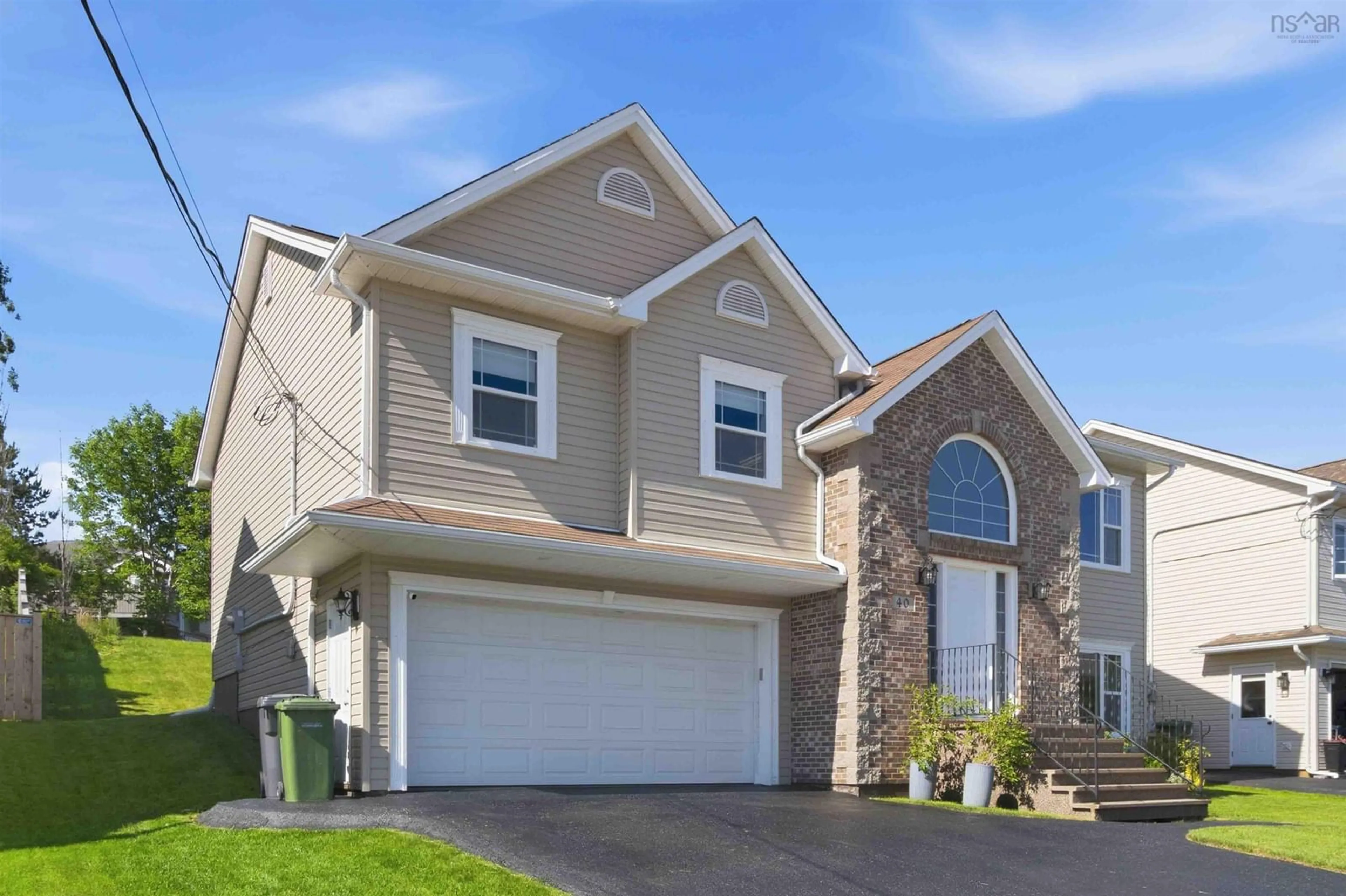 Home with vinyl exterior material, street for 40 Baker Dr, Middle Sackville Nova Scotia B4E 1V1