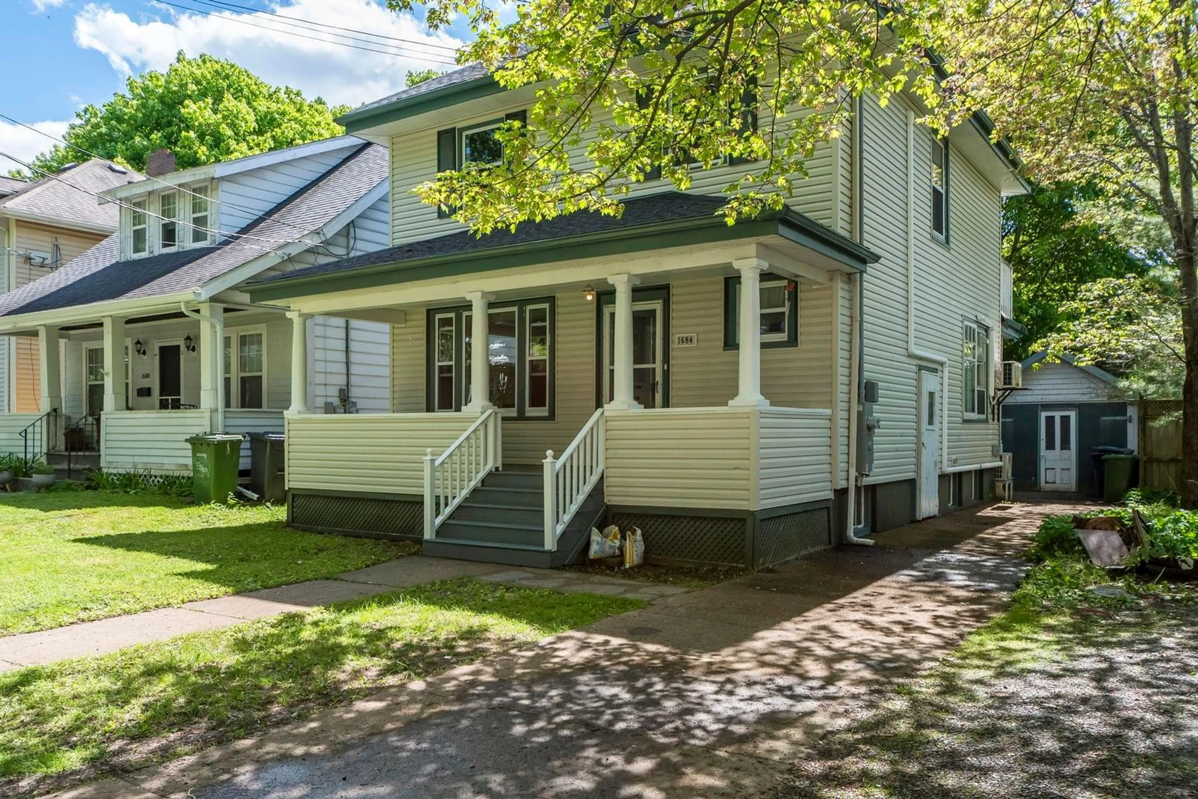 Home with vinyl exterior material, street for 1684 Walnut St, Halifax Nova Scotia B3H 3S4