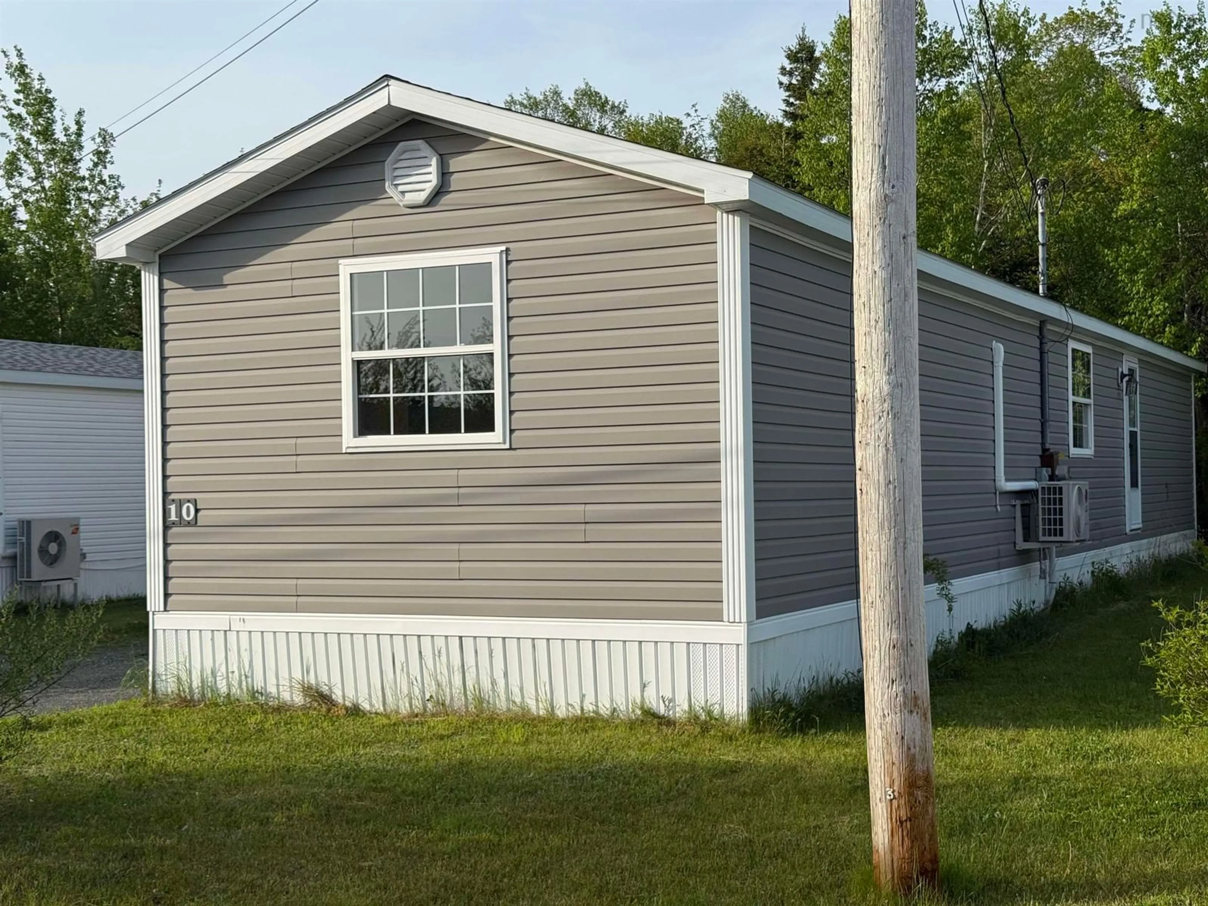 Home with vinyl exterior material, street for 10 Park St, Howie Centre Nova Scotia B1L 1C9