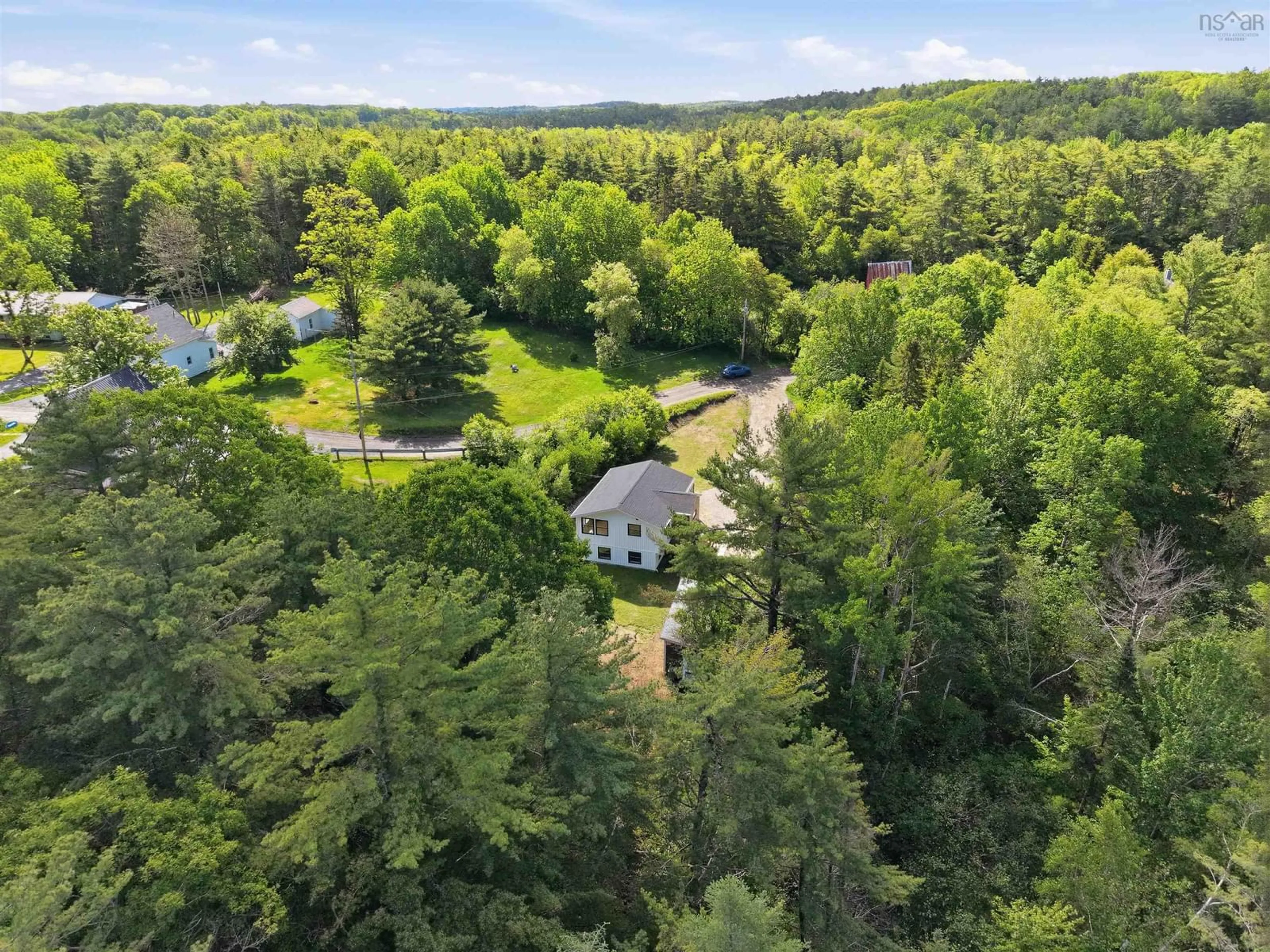 A pic from outside/outdoor area/front of a property/back of a property/a pic from drone, forest/trees view for 178 Fairmont St, Mahone Bay Nova Scotia B0J 2E0
