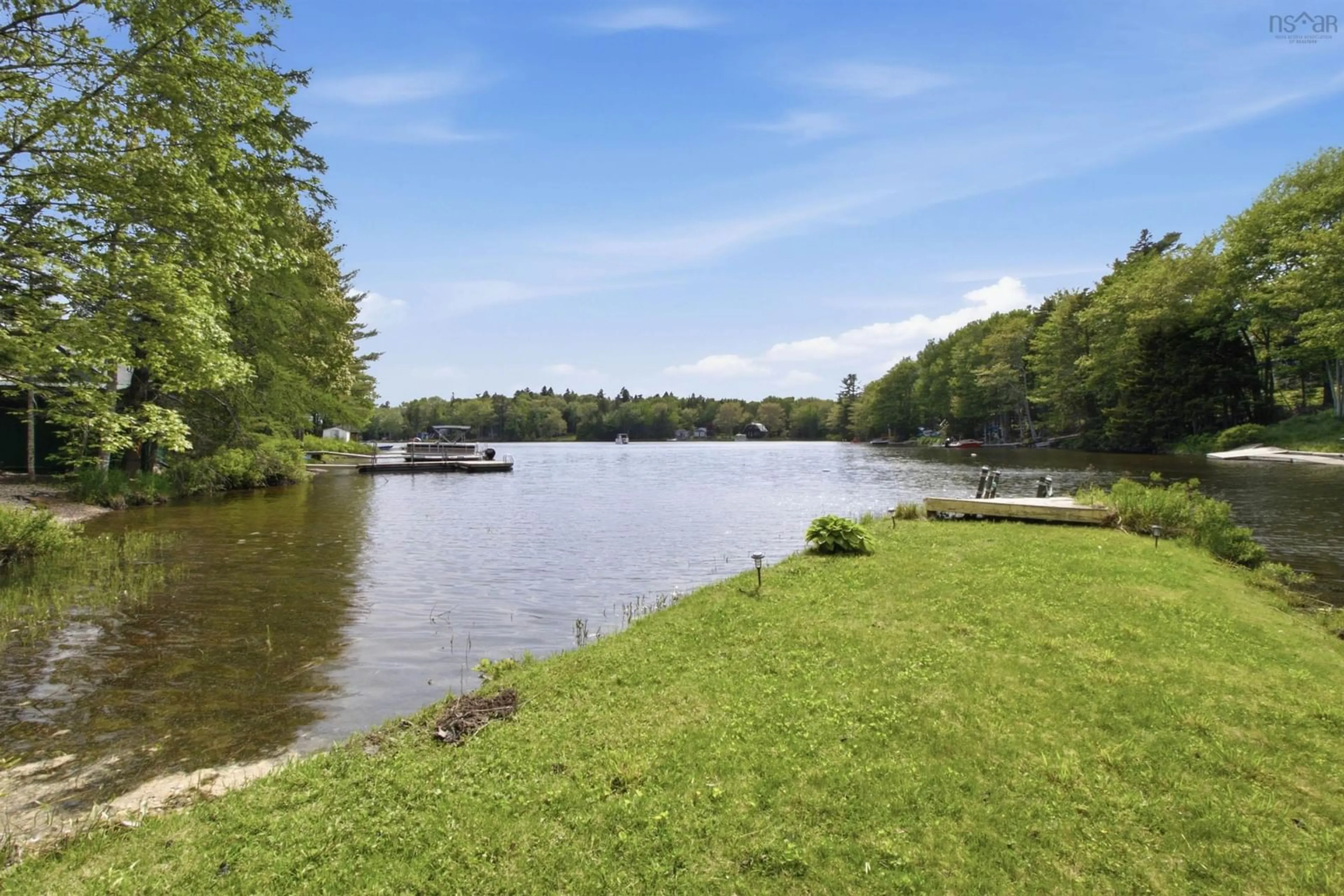 A pic from outside/outdoor area/front of a property/back of a property/a pic from drone, water/lake/river/ocean view for 11 Cove Rd, East Uniacke Nova Scotia B0N 1Z0