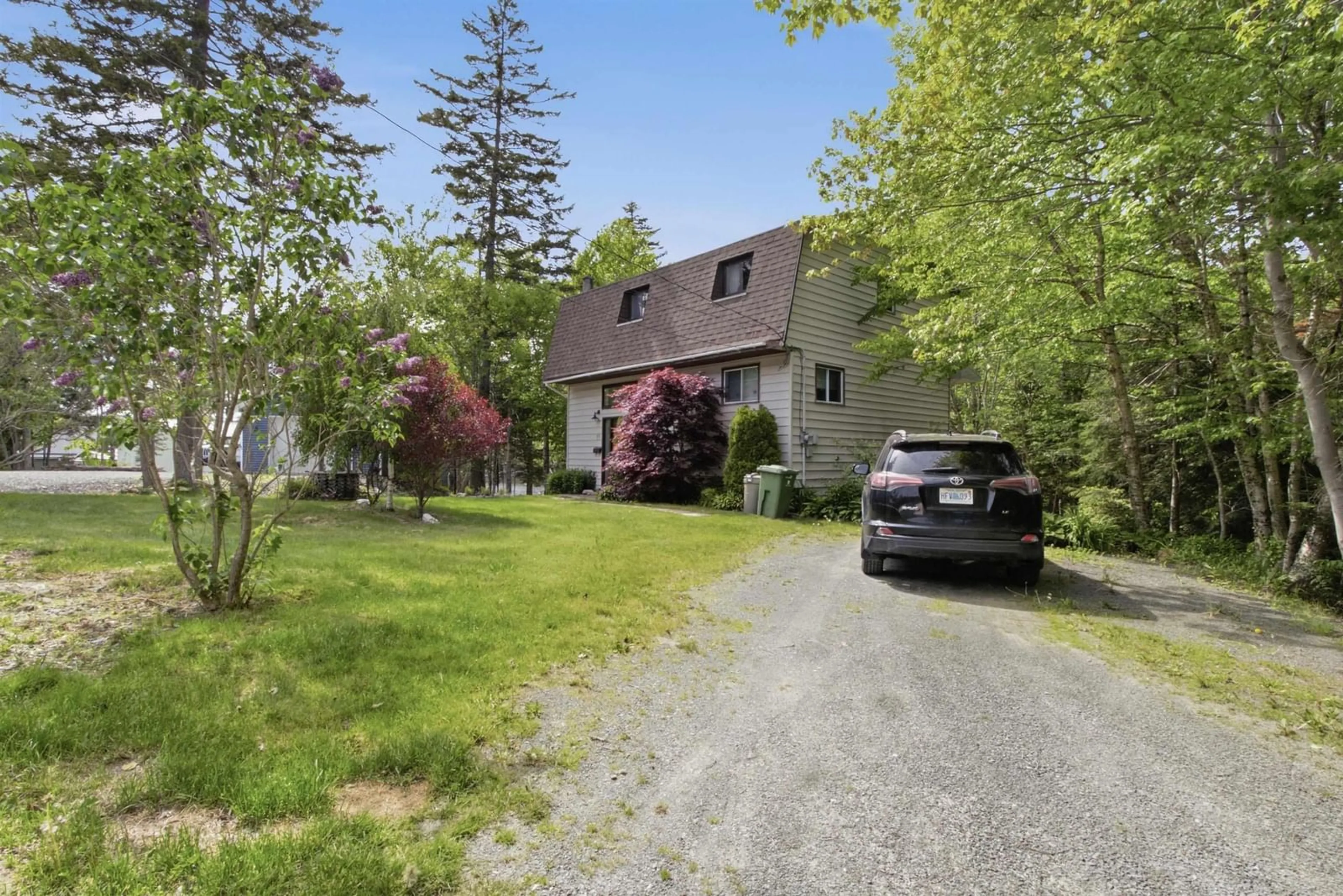 A pic from outside/outdoor area/front of a property/back of a property/a pic from drone, street for 11 Cove Rd, East Uniacke Nova Scotia B0N 1Z0