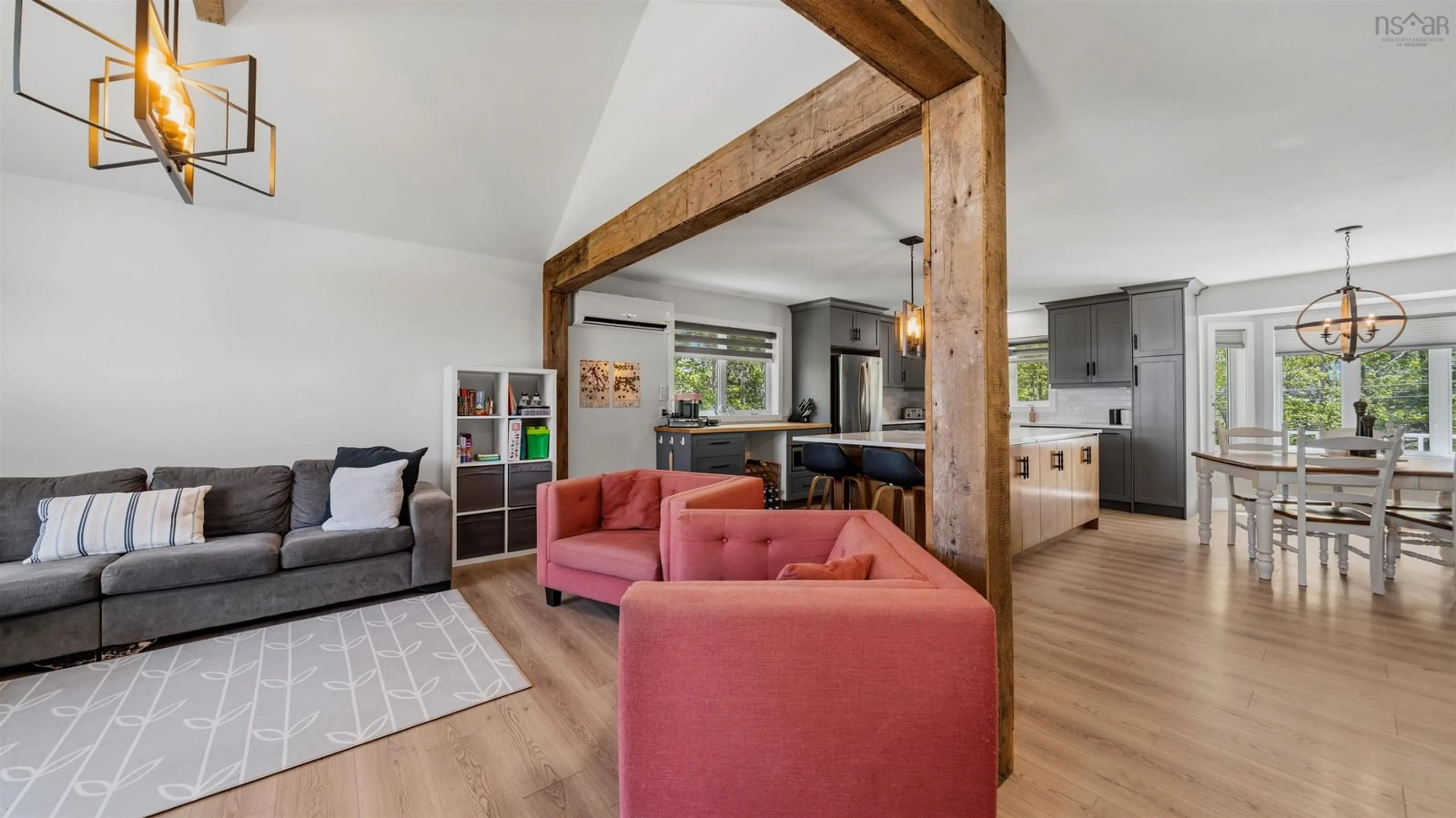 Living room with furniture, wood/laminate floor for 42 Oceanbreeze Ave, Herring Cove Nova Scotia B3V 1H5