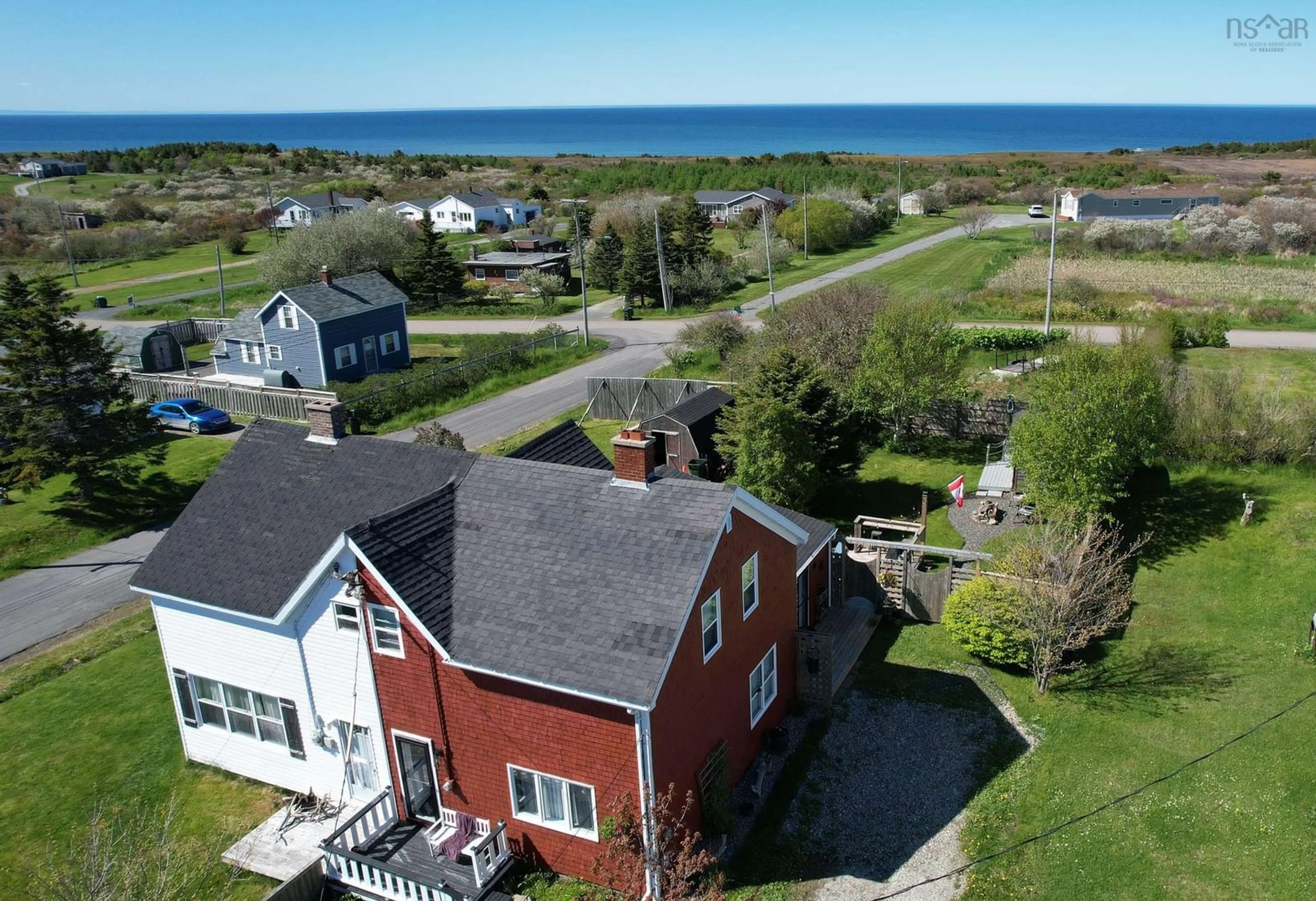 A pic from outside/outdoor area/front of a property/back of a property/a pic from drone, water/lake/river/ocean view for 134 Centre Ave, Donkin Nova Scotia B1A 6N6