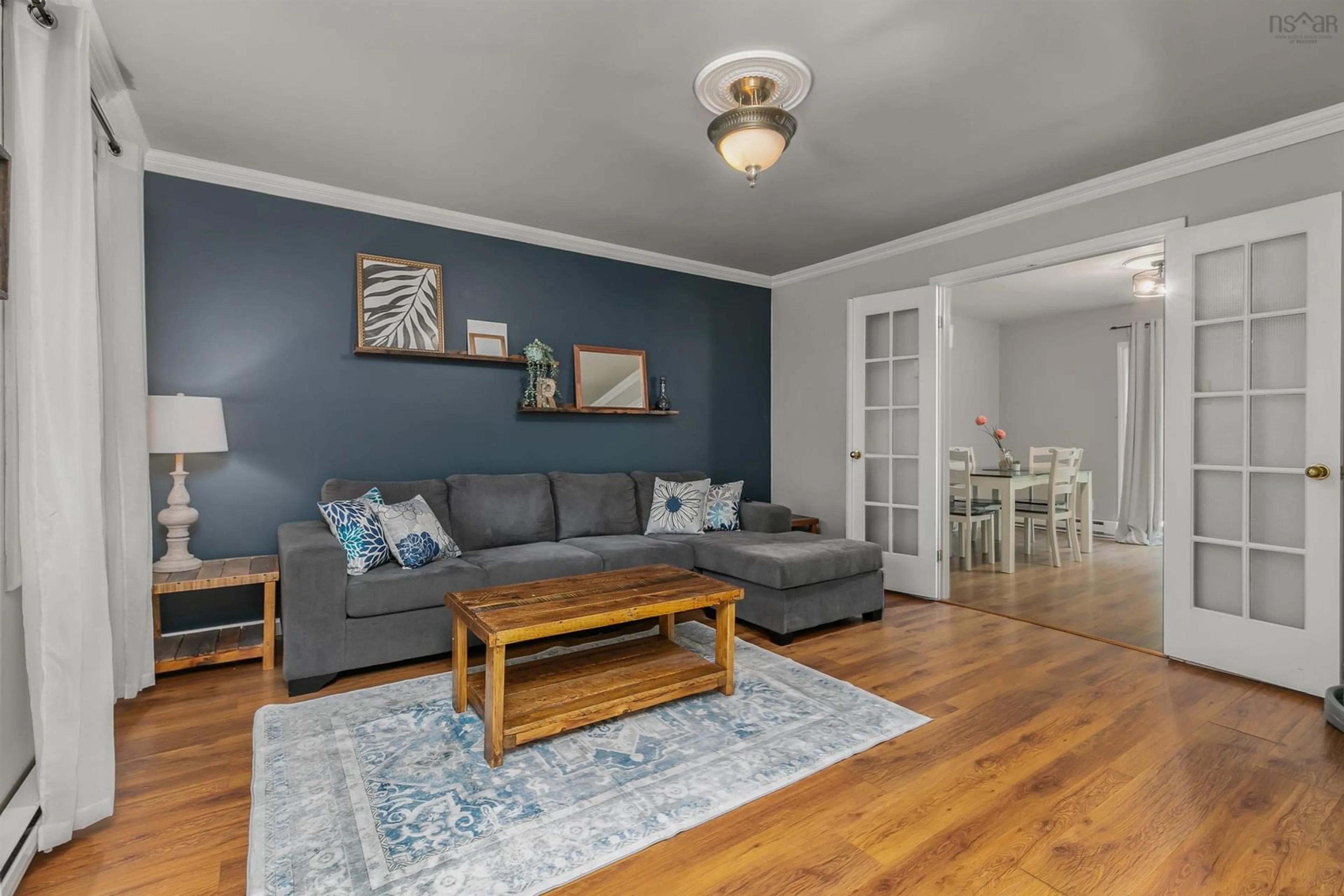 Living room with furniture, wood/laminate floor for 4 Beamish Rd, Mount Uniacke Nova Scotia B0N 1Z0