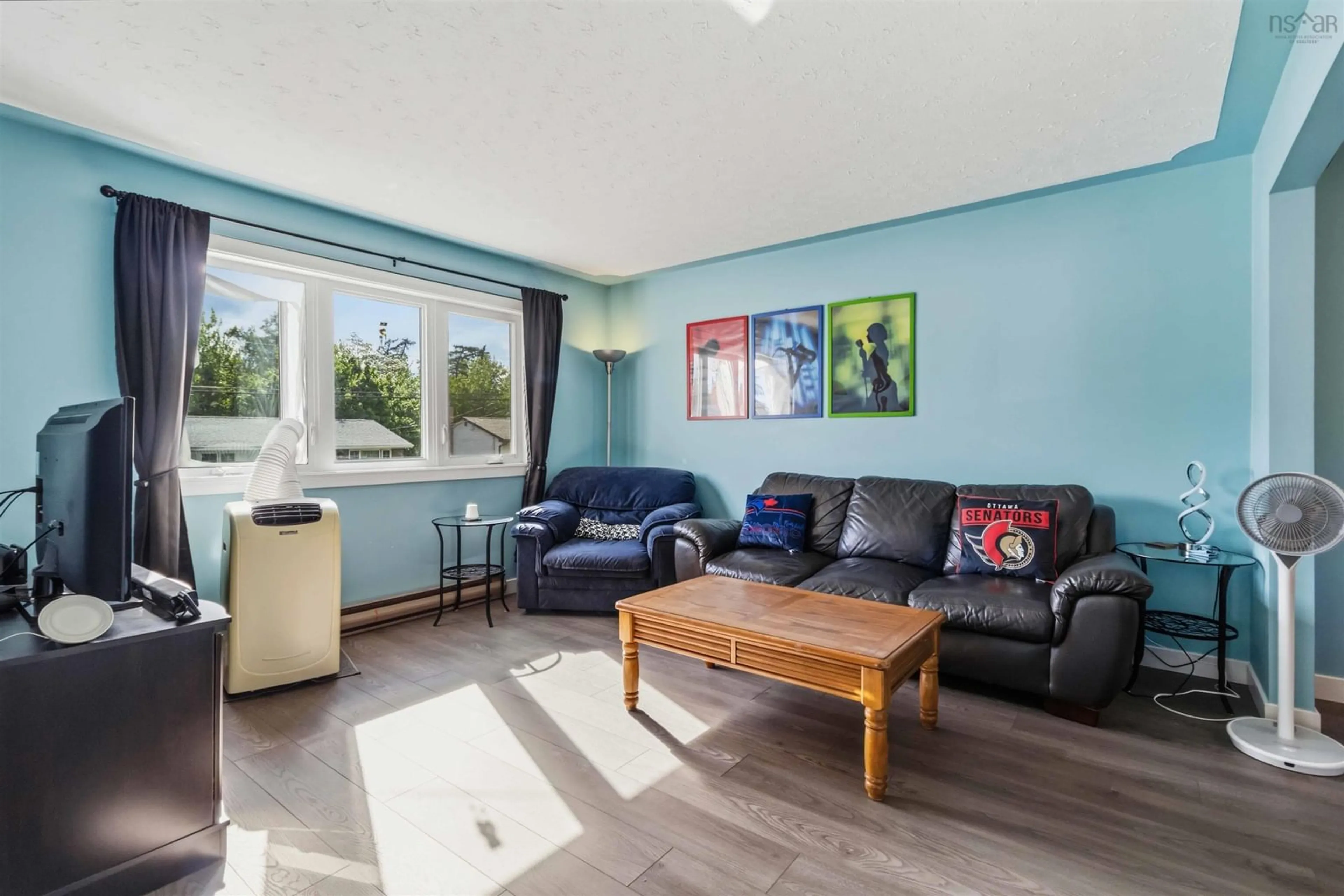 Living room with furniture, wood/laminate floor for 54 Silistria Dr, Cole Harbour Nova Scotia B2W 5V7