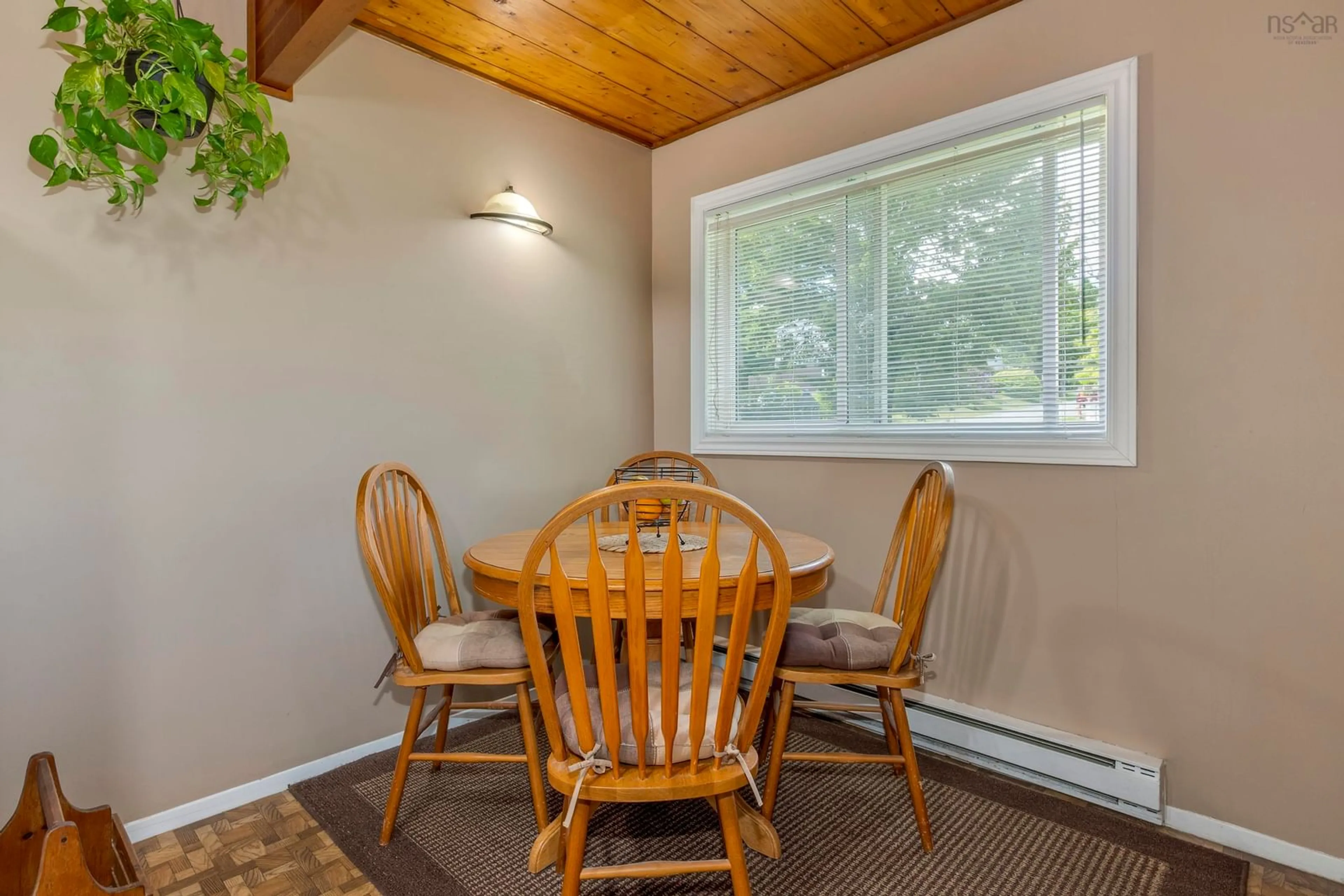Dining room, wood/laminate floor for 38 Drumdonald Rd, Spryfield Nova Scotia B3P 2K9