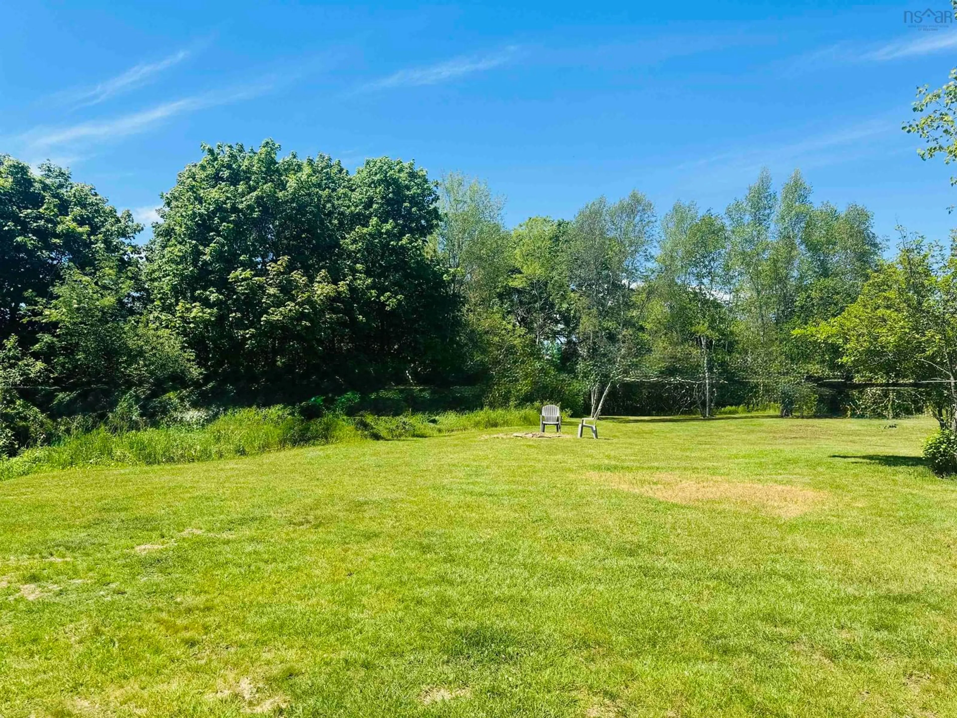 A pic from outside/outdoor area/front of a property/back of a property/a pic from drone, forest/trees view for 189 Willow St, Parrsboro Nova Scotia B0M 1S0
