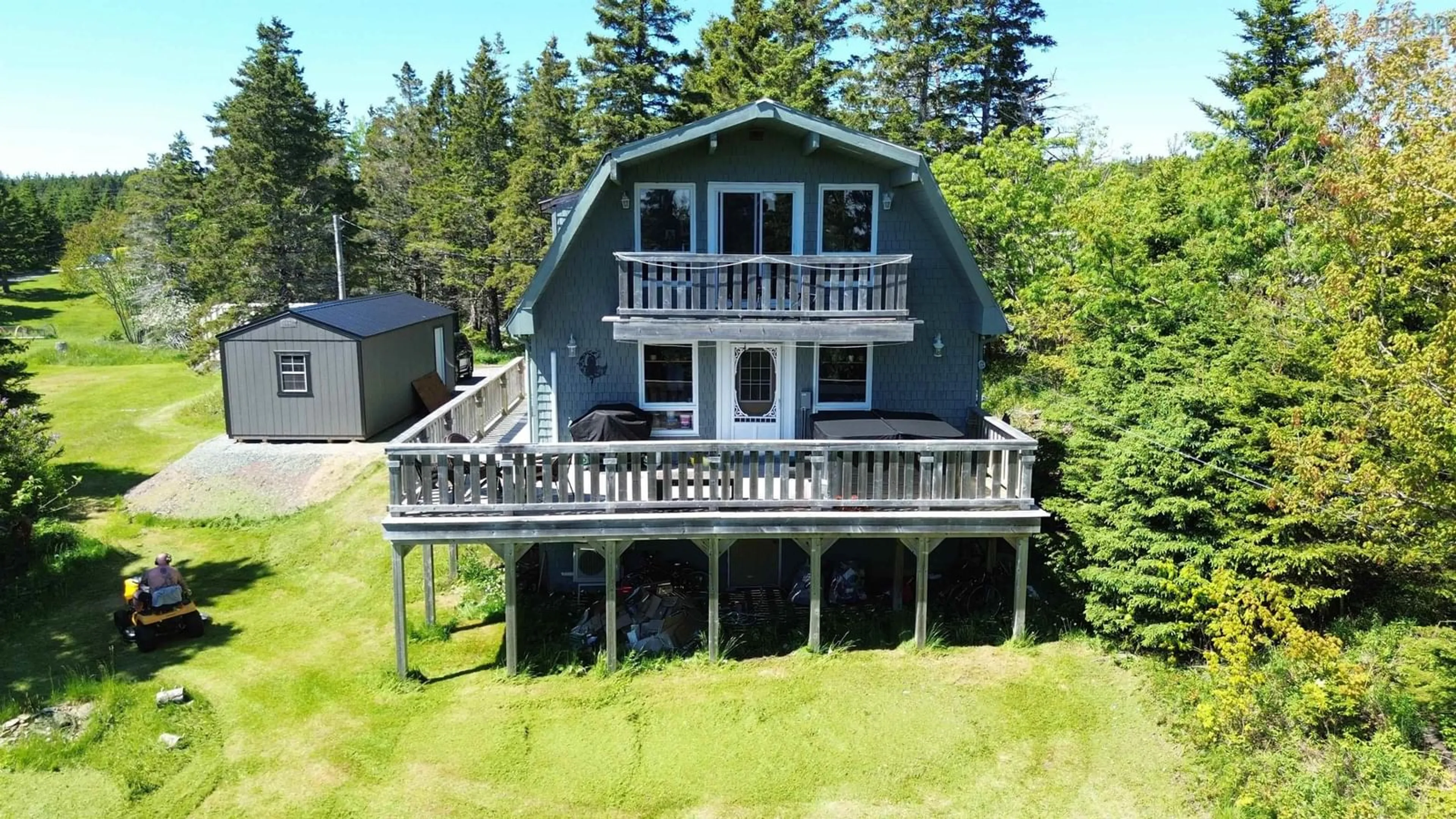 A pic from outside/outdoor area/front of a property/back of a property/a pic from drone, water/lake/river/ocean view for 8710 Highway 4, River Bourgeois Nova Scotia B0E 2X0