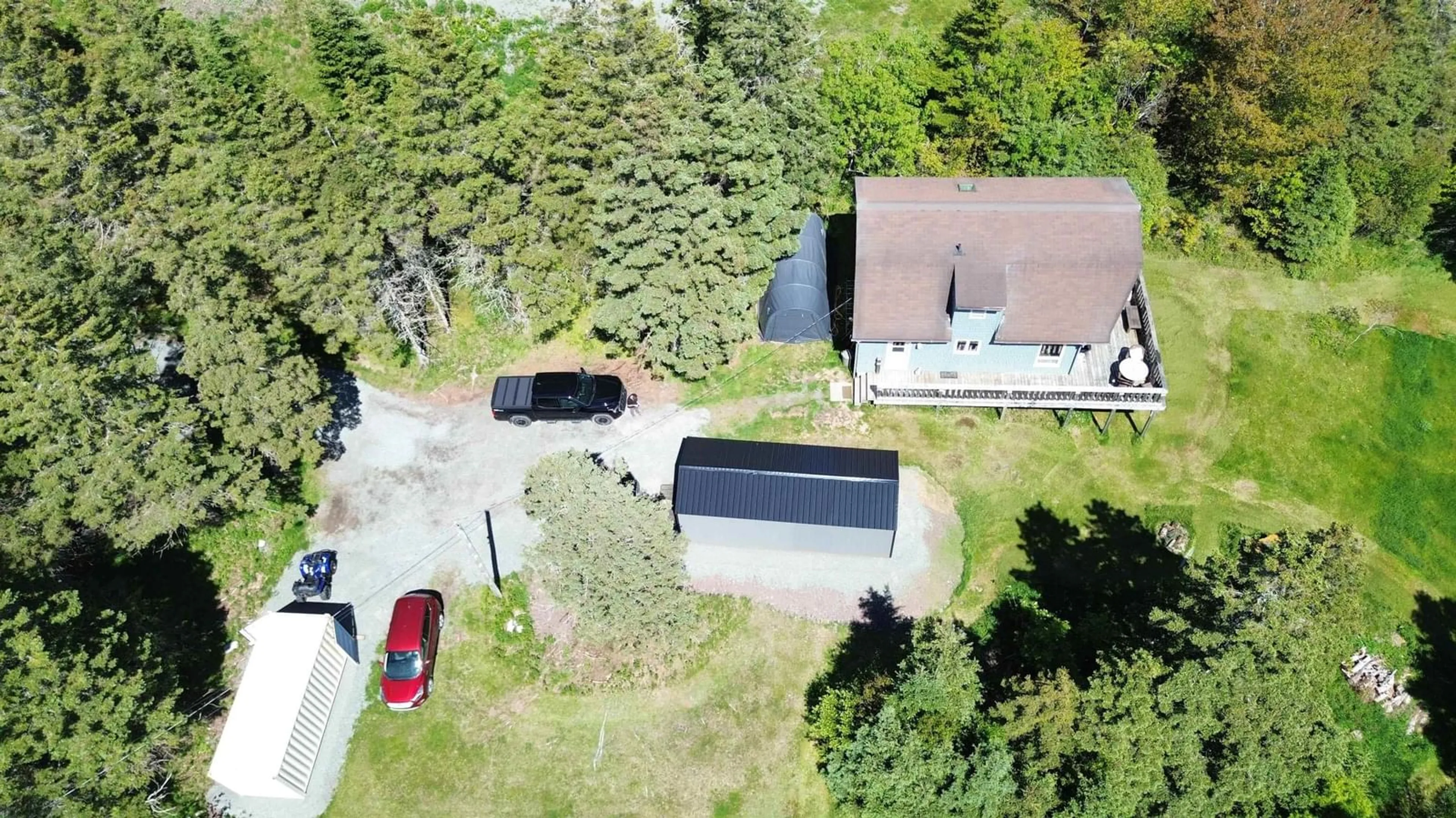 A pic from outside/outdoor area/front of a property/back of a property/a pic from drone, street for 8710 Highway 4, River Bourgeois Nova Scotia B0E 2X0