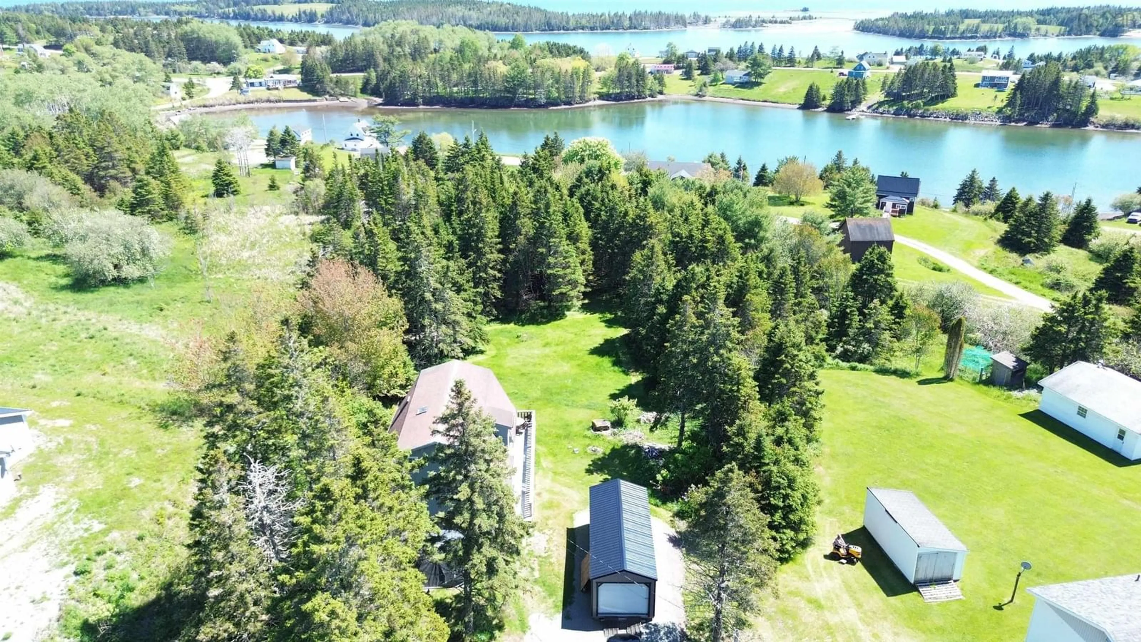 A pic from outside/outdoor area/front of a property/back of a property/a pic from drone, water/lake/river/ocean view for 8710 Highway 4, River Bourgeois Nova Scotia B0E 2X0