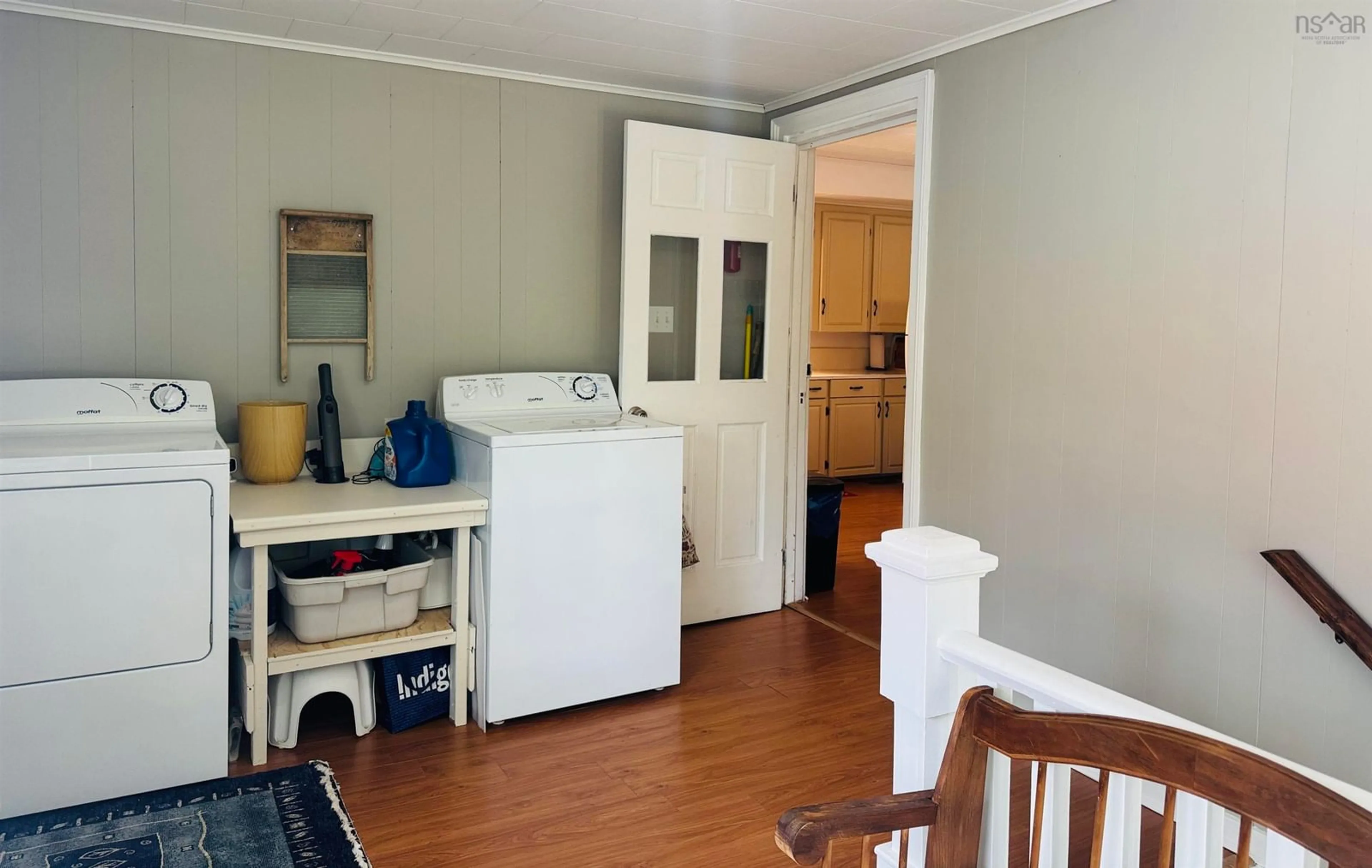 Kitchen with laundary machines, wood/laminate floor for 3757 Eastern Ave, Parrsboro Nova Scotia B0M 1S0