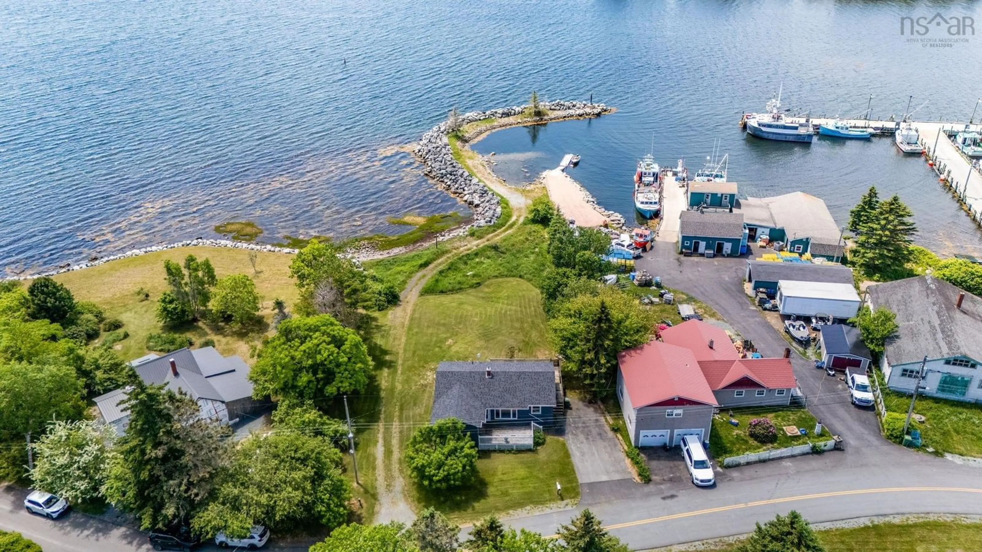 A pic from outside/outdoor area/front of a property/back of a property/a pic from drone, water/lake/river/ocean view for 58 Newell Rd, Voglers Cove Nova Scotia B0J 2H0