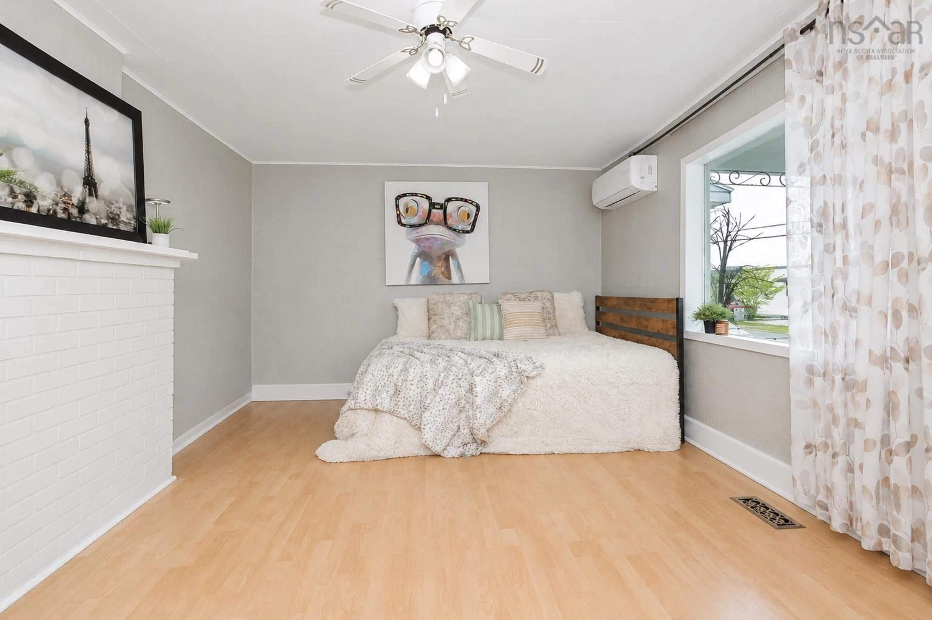Bedroom with bed, wood/laminate floor for 32 Richmond St, Sydney Nova Scotia B1P 2T9