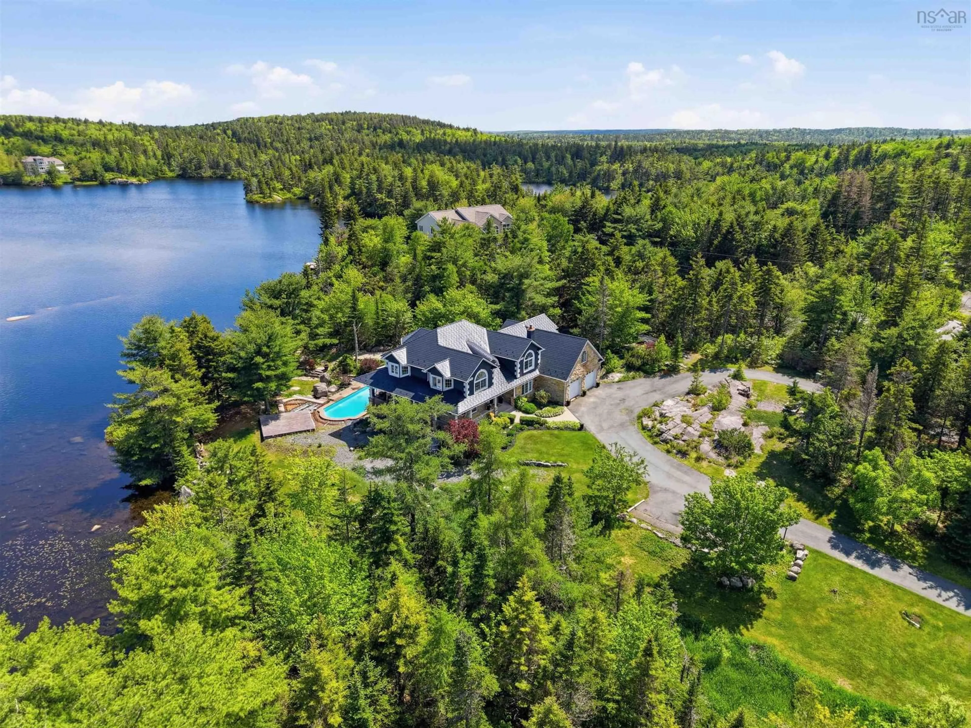 A pic from outside/outdoor area/front of a property/back of a property/a pic from drone, water/lake/river/ocean view for 96 Lake Mist Dr, Hammonds Plains Nova Scotia B4B 1X2