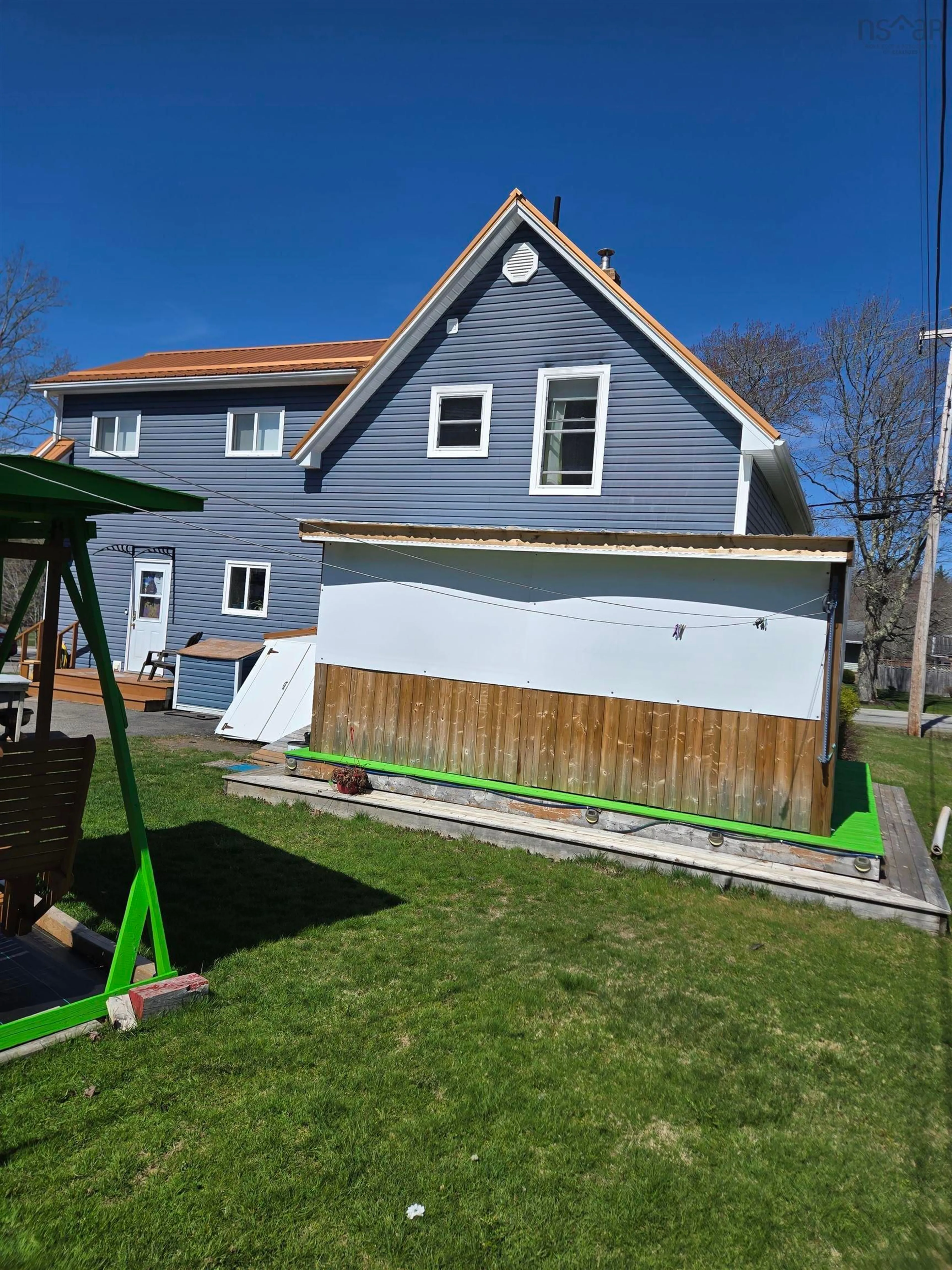 Home with vinyl exterior material, street for 4935 Highway 10, New Germany Nova Scotia B0R 1E0