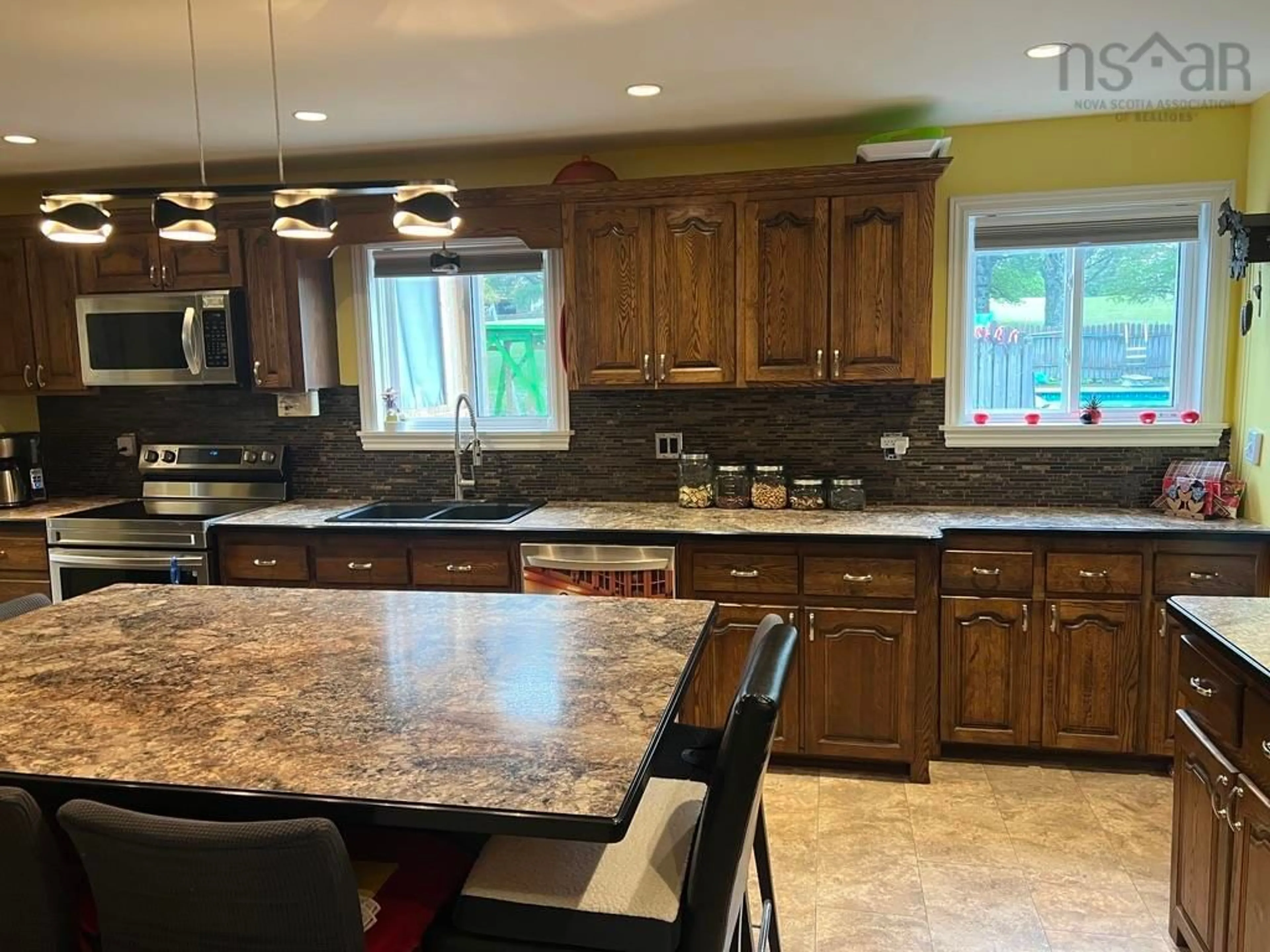 Open concept kitchen, ceramic/tile floor for 4935 Highway 10, New Germany Nova Scotia B0R 1E0