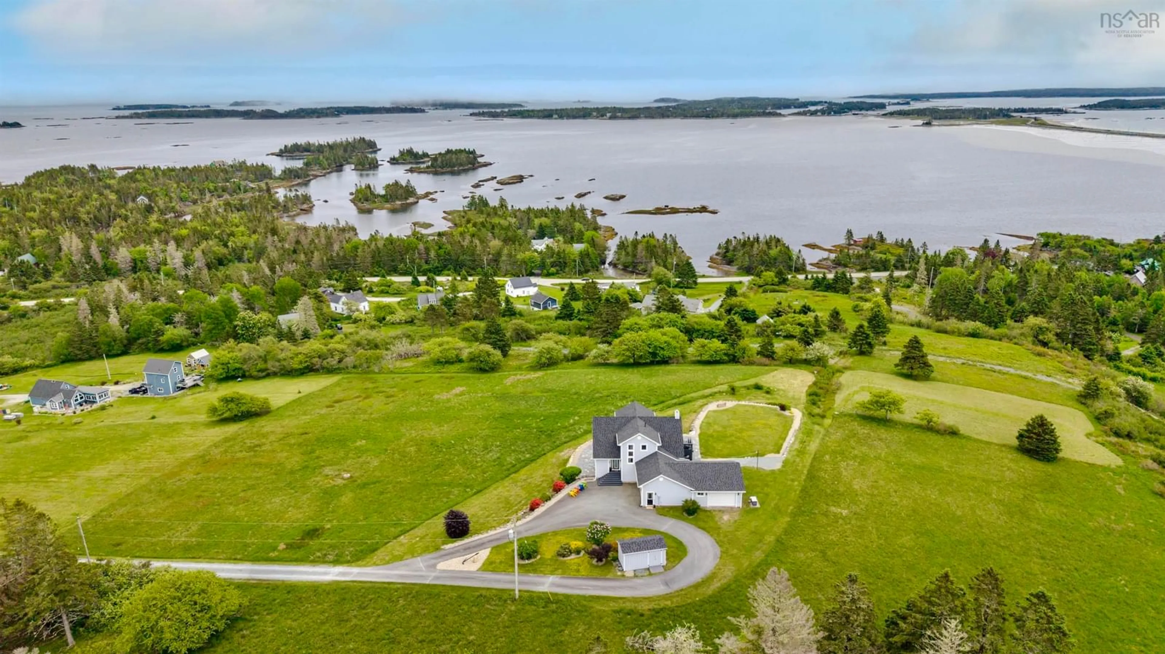 A pic from outside/outdoor area/front of a property/back of a property/a pic from drone, water/lake/river/ocean view for 101 Razilly Lane, Crescent Beach Nova Scotia B0R 1C0