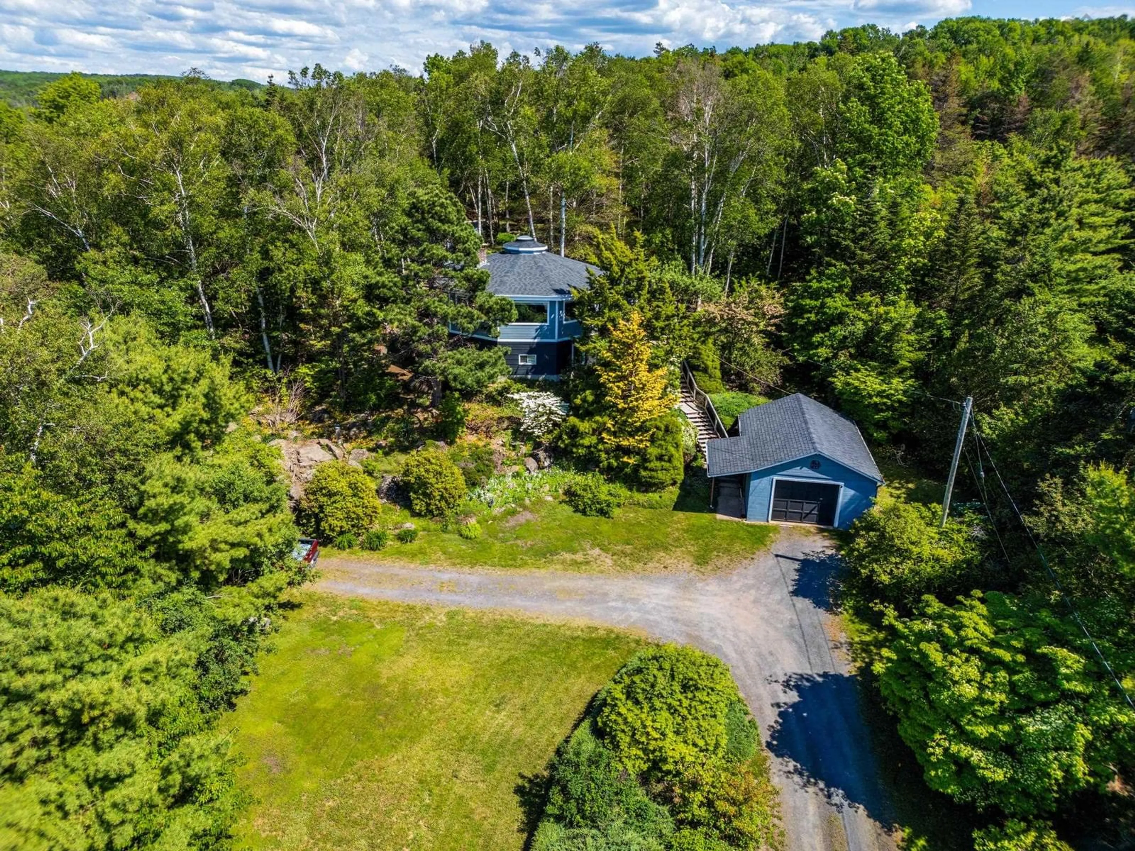 A pic from outside/outdoor area/front of a property/back of a property/a pic from drone, water/lake/river/ocean view for 894 Highway 1, Smiths Cove Nova Scotia B0S 1S0