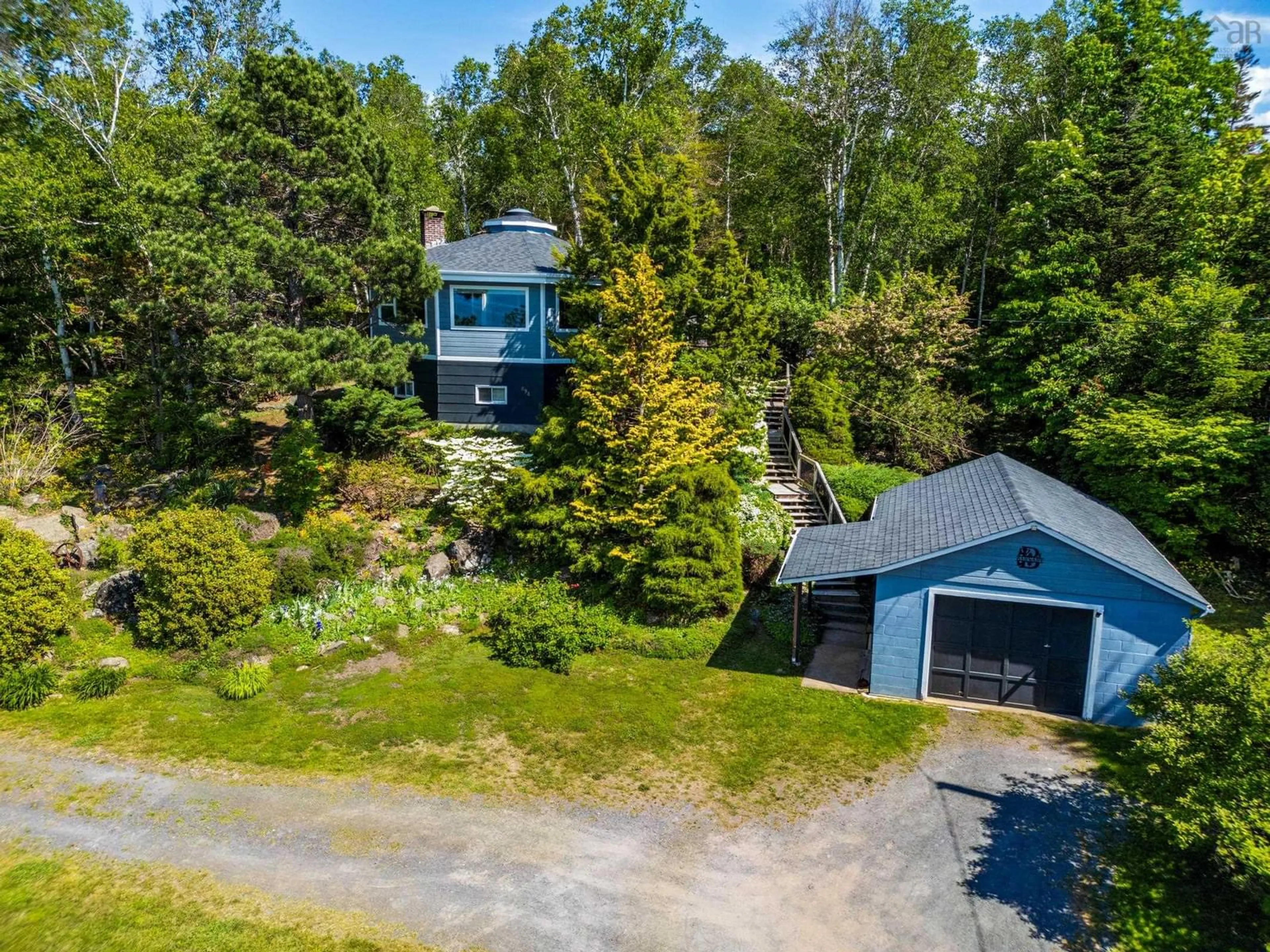 A pic from outside/outdoor area/front of a property/back of a property/a pic from drone, water/lake/river/ocean view for 894 Highway 1, Smiths Cove Nova Scotia B0S 1S0