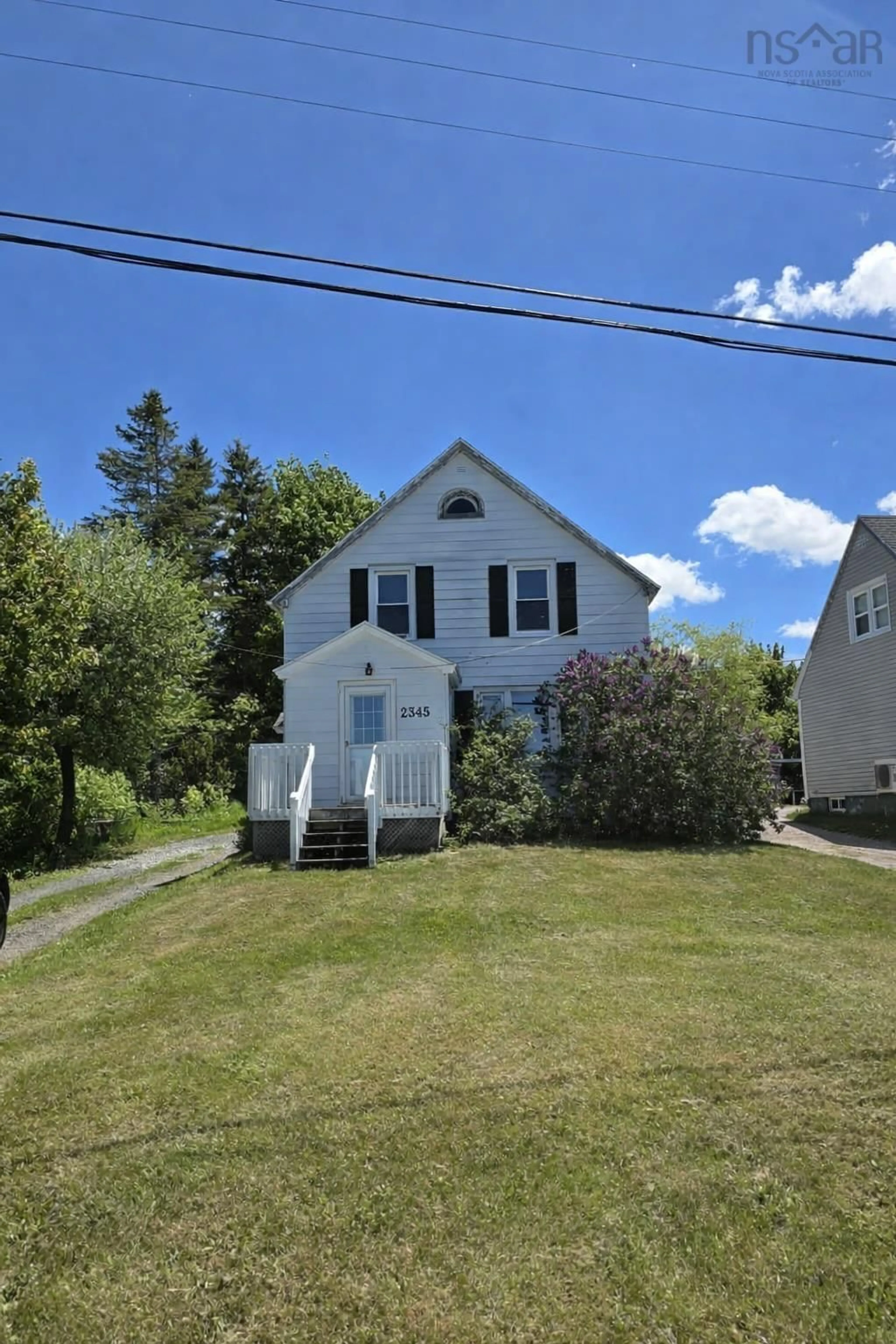 A pic from outside/outdoor area/front of a property/back of a property/a pic from drone, street for 2345 Highway 239 Hwy, Point Edward Nova Scotia B2A 4R3