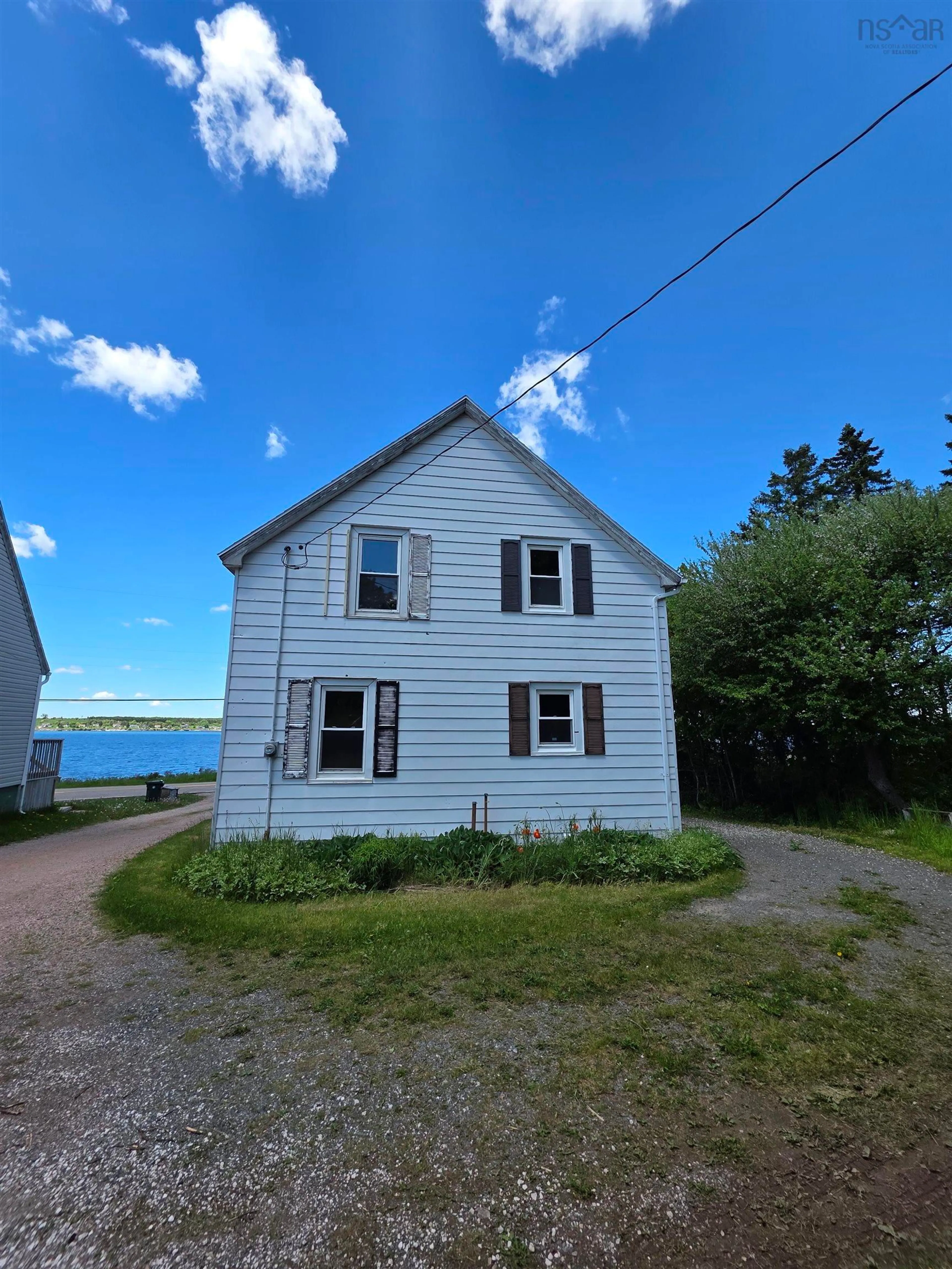 A pic from outside/outdoor area/front of a property/back of a property/a pic from drone, building for 2345 Highway 239 Hwy, Point Edward Nova Scotia B2A 4R3