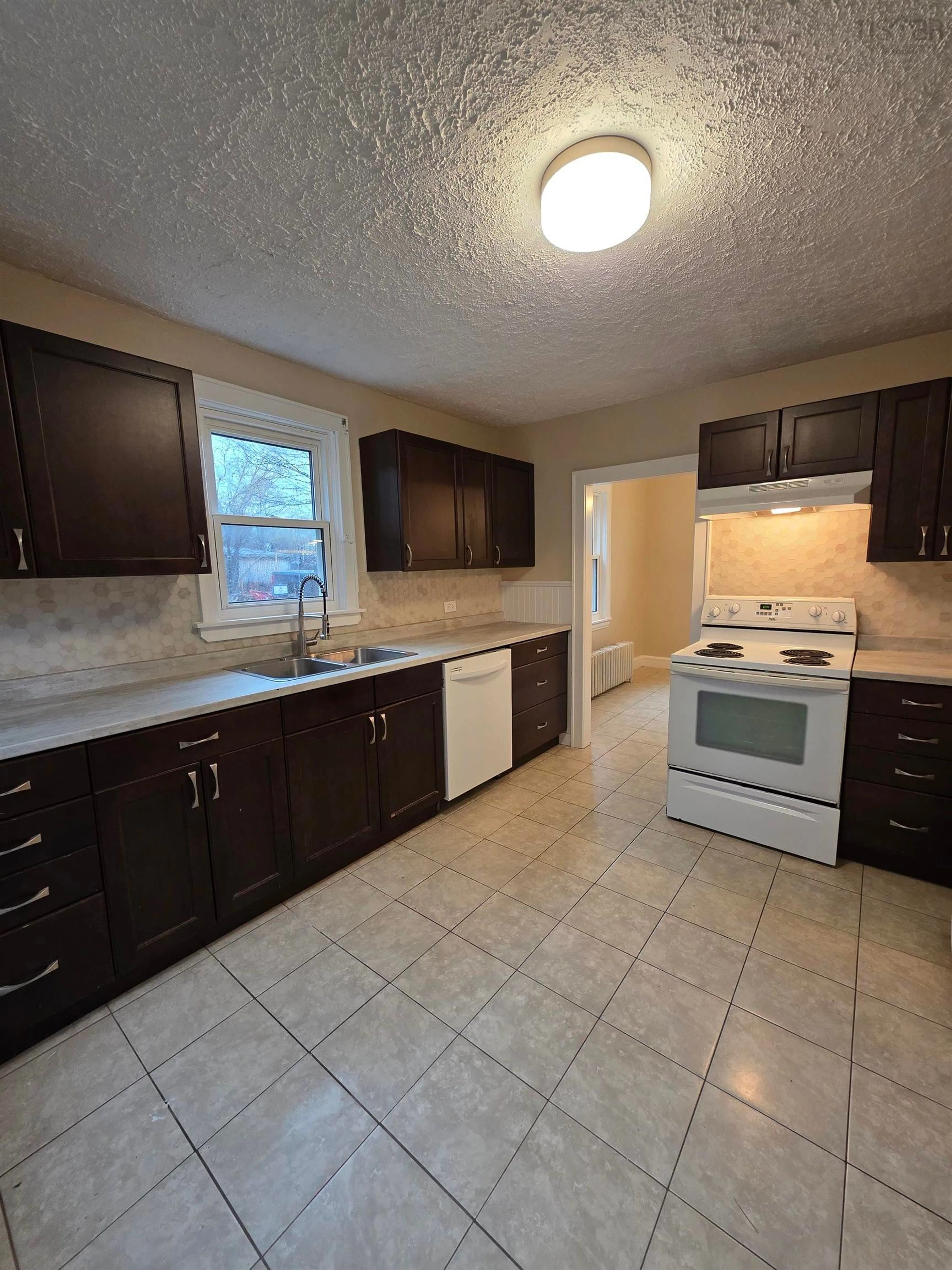 Standard kitchen, ceramic/tile floor for 2345 Highway 239 Hwy, Point Edward Nova Scotia B2A 4R3