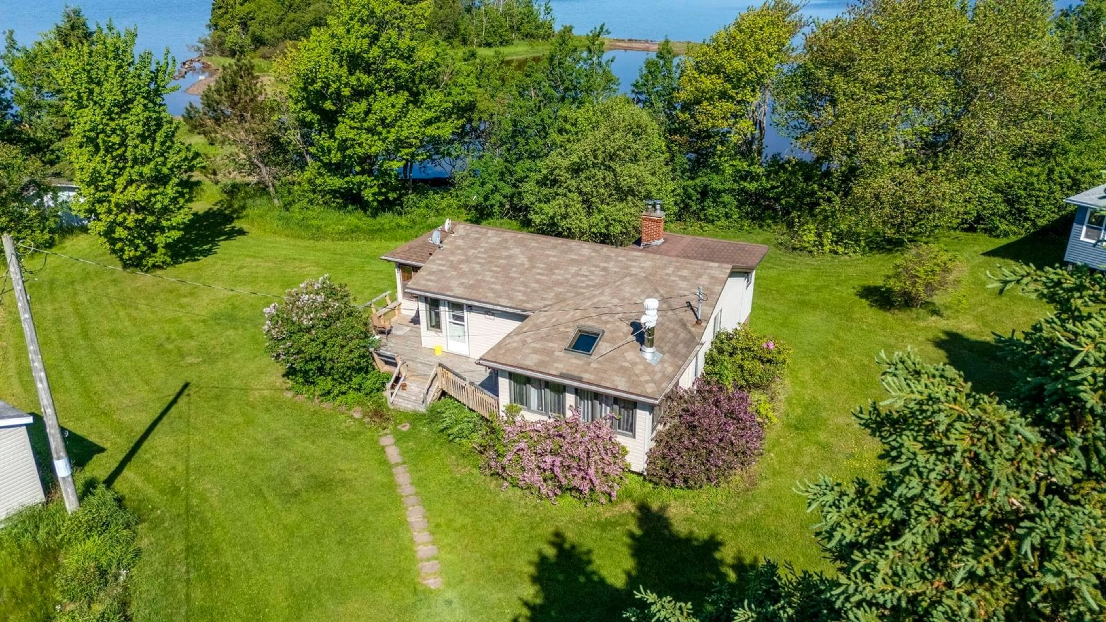 A pic from outside/outdoor area/front of a property/back of a property/a pic from drone, water/lake/river/ocean view for 19 Ernies Lane, Caribou Island Nova Scotia B0K 1H0