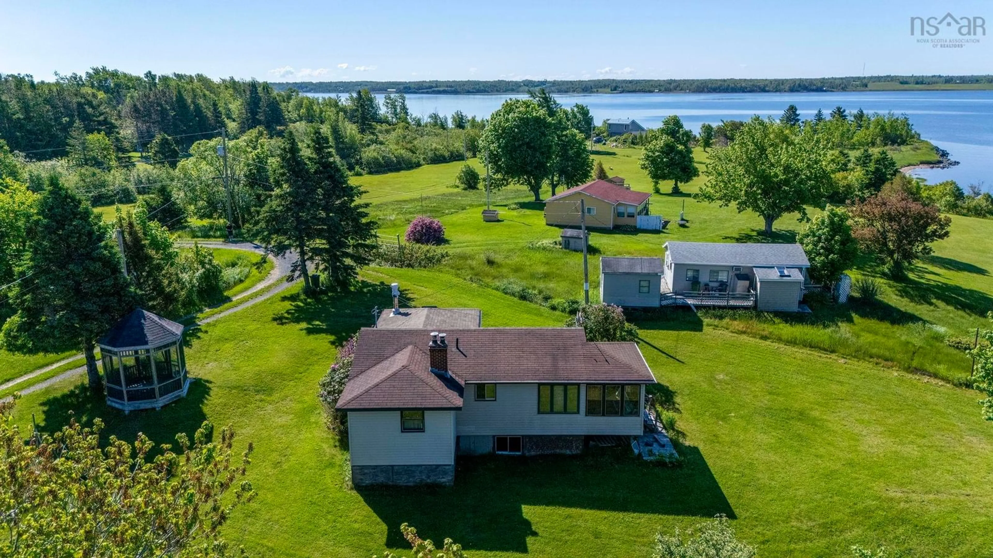A pic from outside/outdoor area/front of a property/back of a property/a pic from drone, water/lake/river/ocean view for 19 Ernies Lane, Caribou Island Nova Scotia B0K 1H0