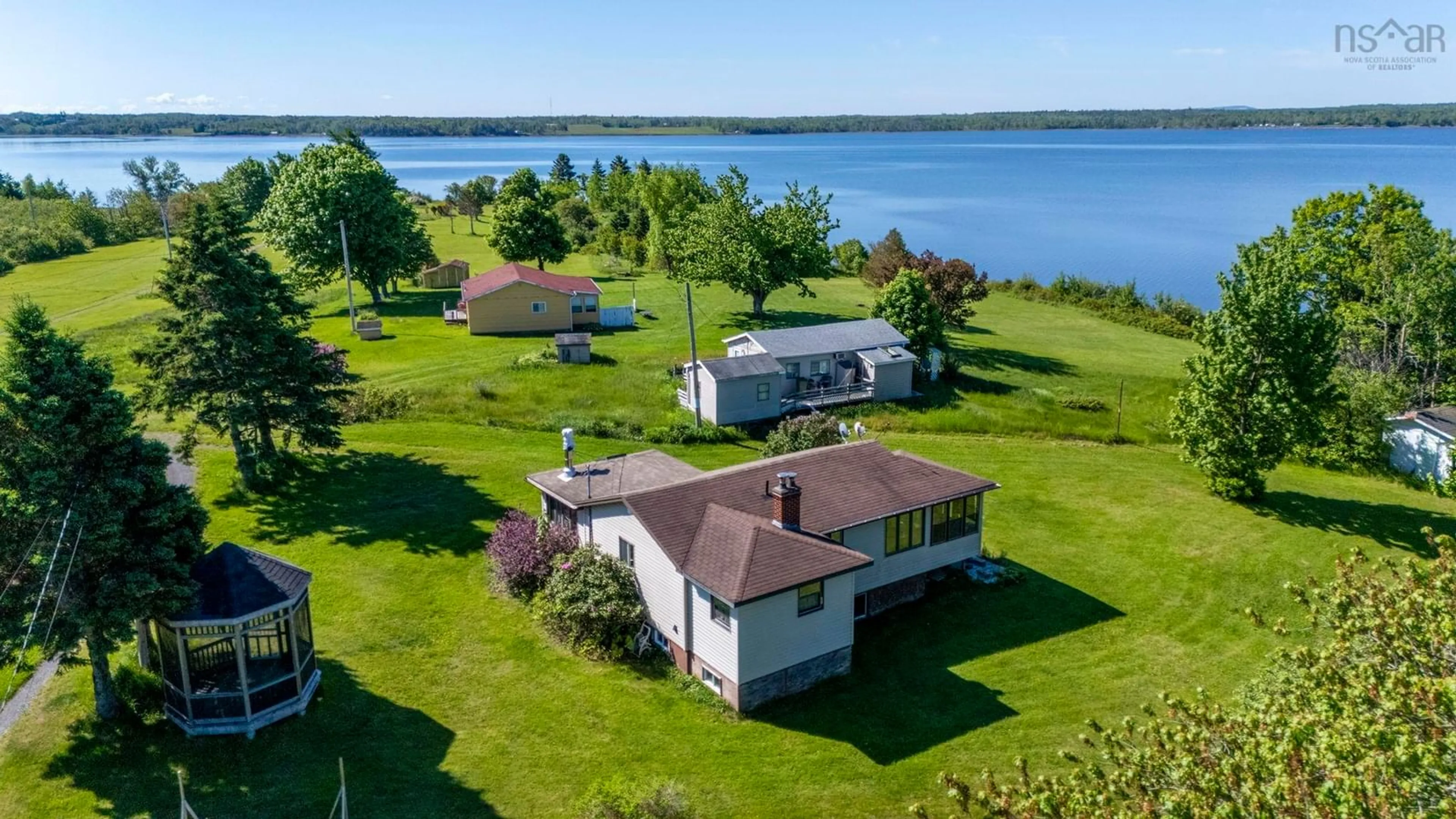 A pic from outside/outdoor area/front of a property/back of a property/a pic from drone, water/lake/river/ocean view for 19 Ernies Lane, Caribou Island Nova Scotia B0K 1H0