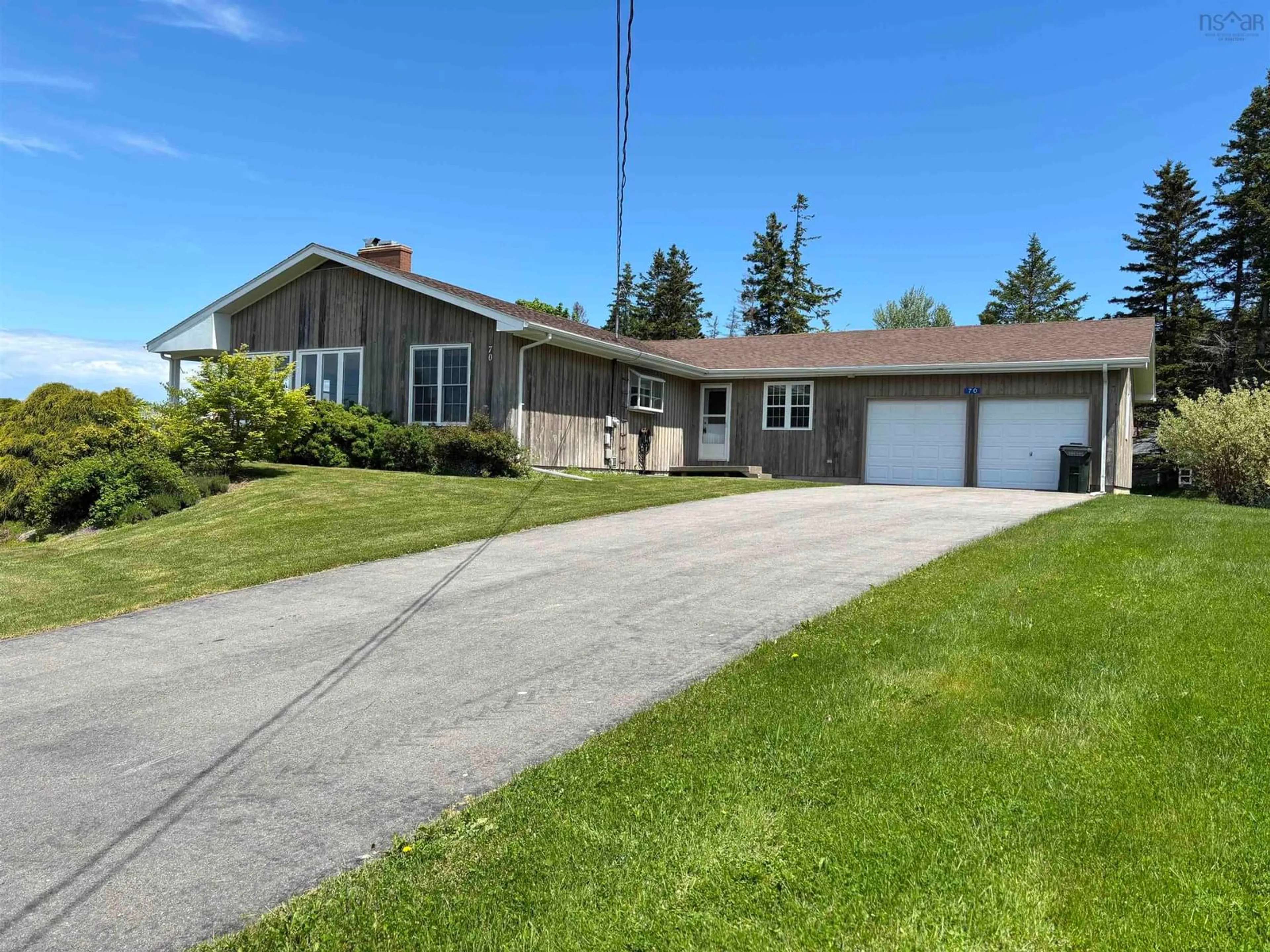 A pic from outside/outdoor area/front of a property/back of a property/a pic from drone, street for 70 Staney Brae Drive, Georges River Nova Scotia B1Y 3G1