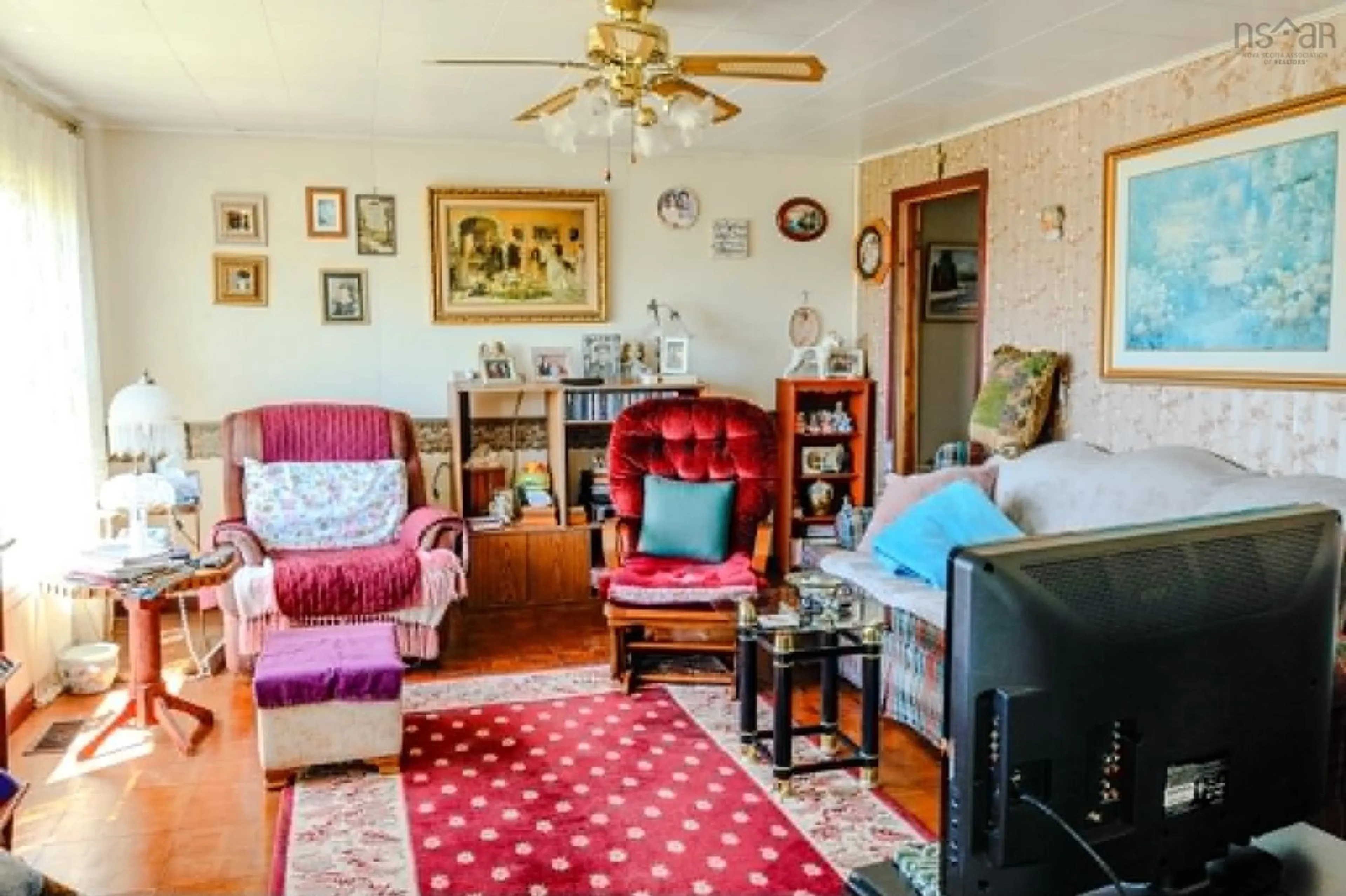 Living room with furniture, unknown for 6502 Highway 3, Lower Woods Harbour Nova Scotia B0W 2E0