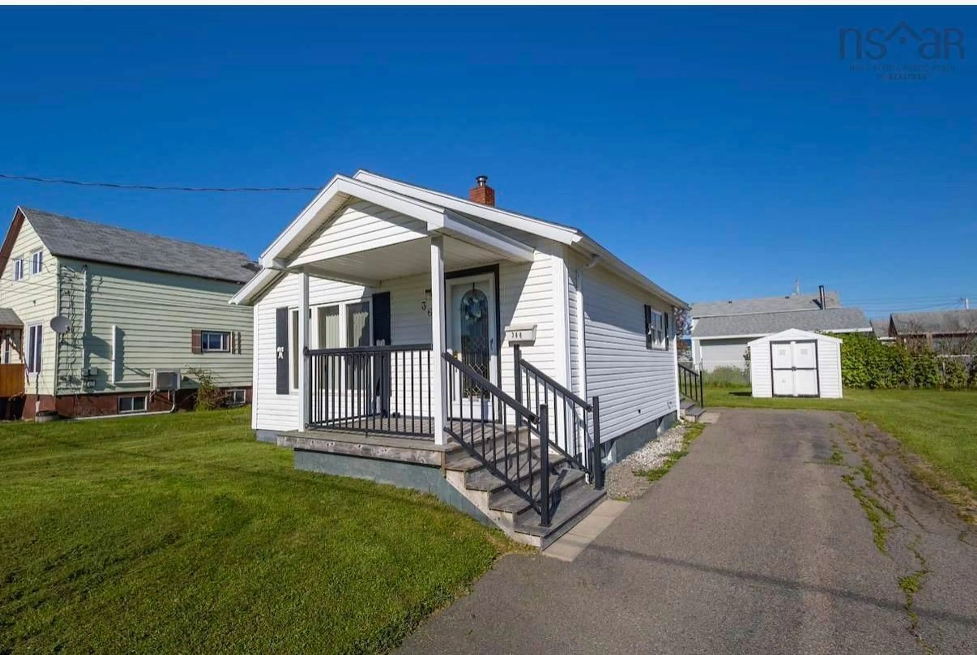 Home with vinyl exterior material, street for 366 12th St, New Waterford Nova Scotia B1H 4A1