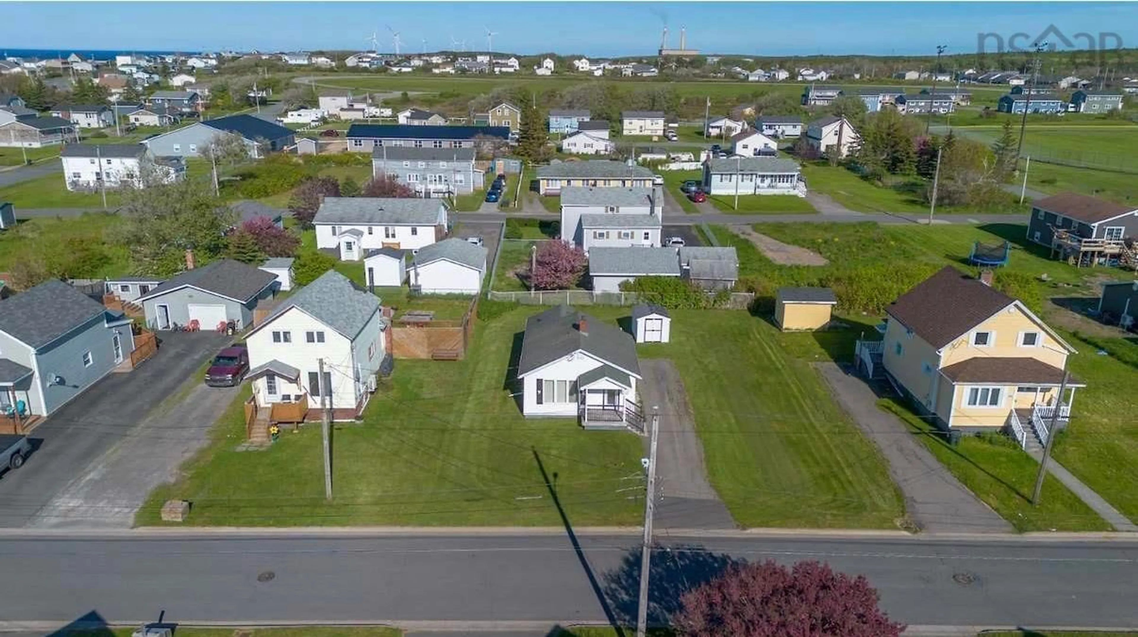 A pic from outside/outdoor area/front of a property/back of a property/a pic from drone, water/lake/river/ocean view for 366 12th St, New Waterford Nova Scotia B1H 4A1