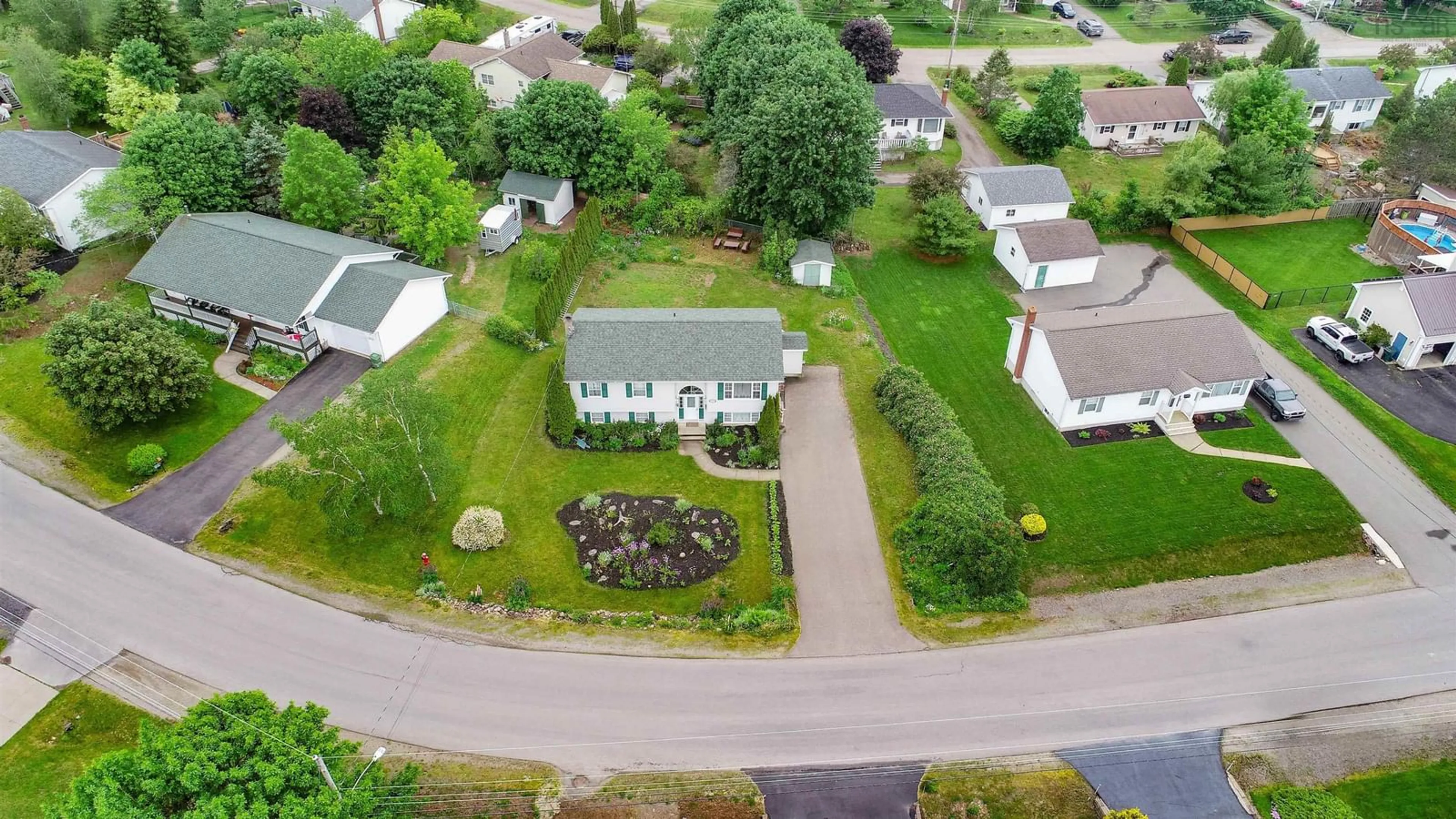 A pic from outside/outdoor area/front of a property/back of a property/a pic from drone, street for 1030 Club Crescent ,New Minas, New Minas Nova Scotia B4N 4Z5