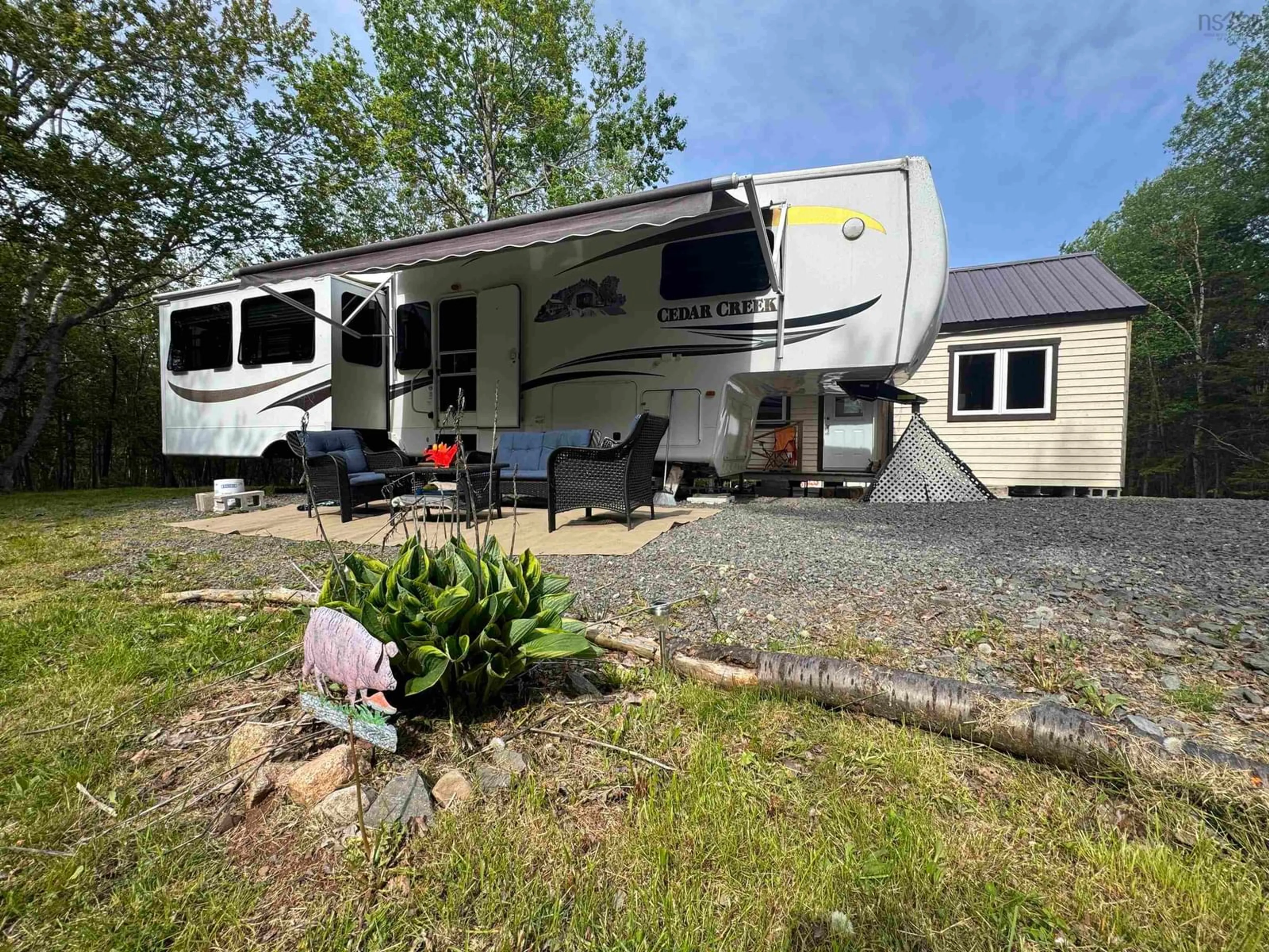 A pic from outside/outdoor area/front of a property/back of a property/a pic from drone, unknown for 15 Bayview Lane, St. Anns Nova Scotia B0E 1B0