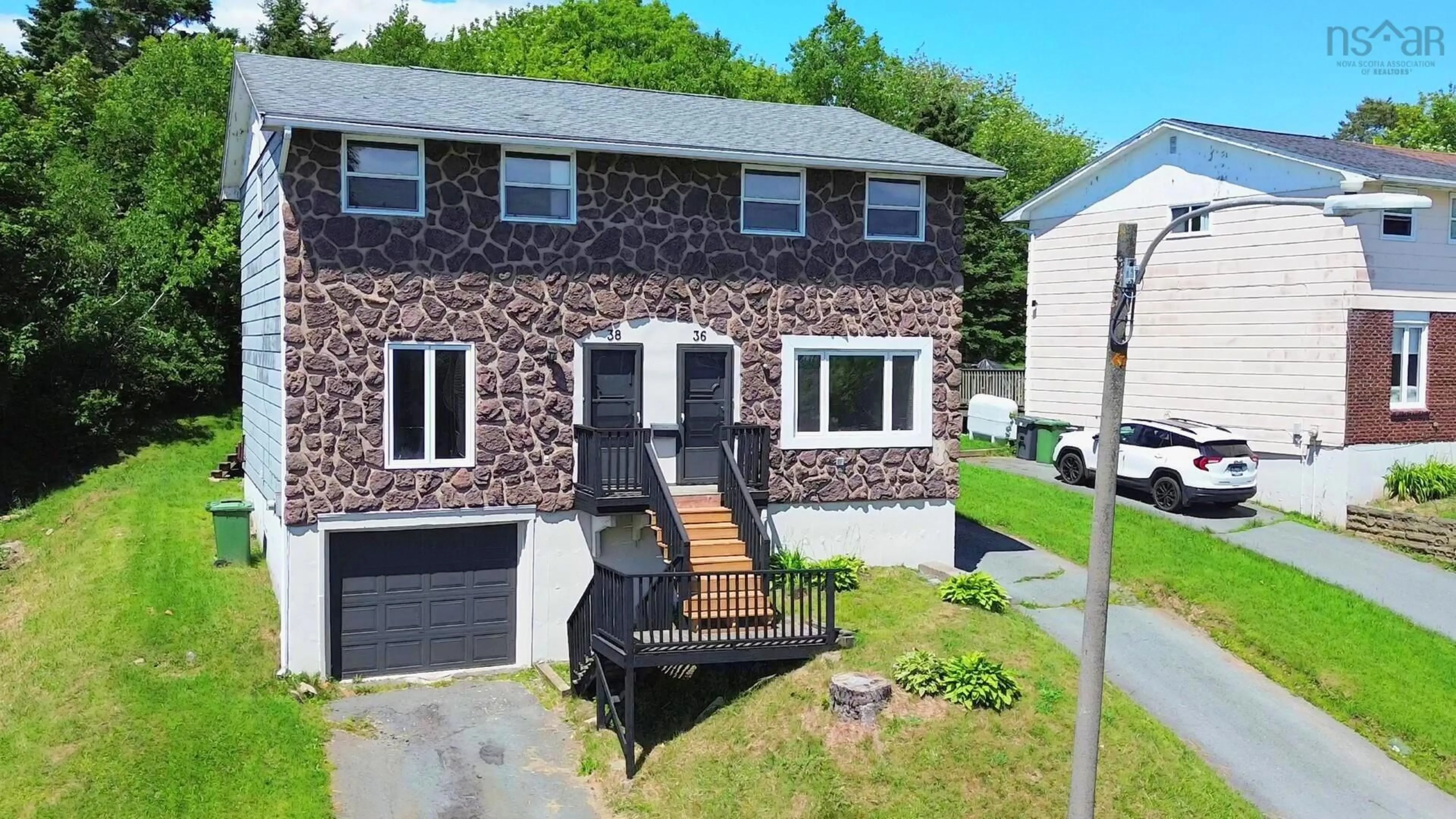 A pic from outside/outdoor area/front of a property/back of a property/a pic from drone, street for 36 Regal Rd, Dartmouth Nova Scotia B2W 4H6
