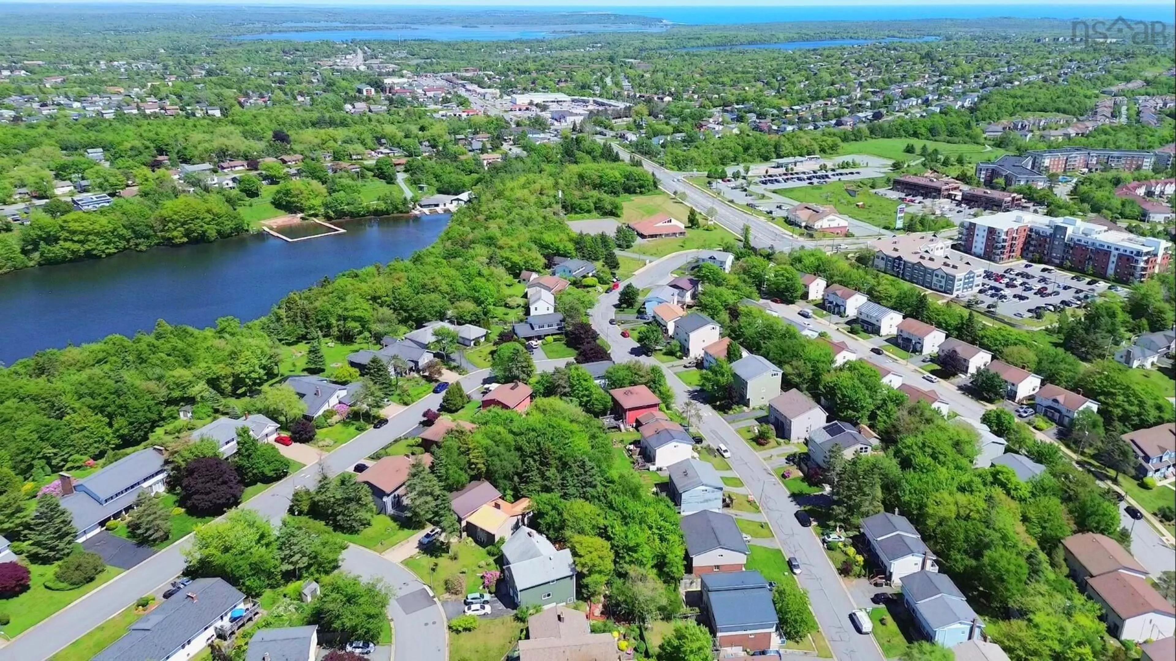 A pic from outside/outdoor area/front of a property/back of a property/a pic from drone, water/lake/river/ocean view for 36 Regal Rd, Dartmouth Nova Scotia B2W 4H6