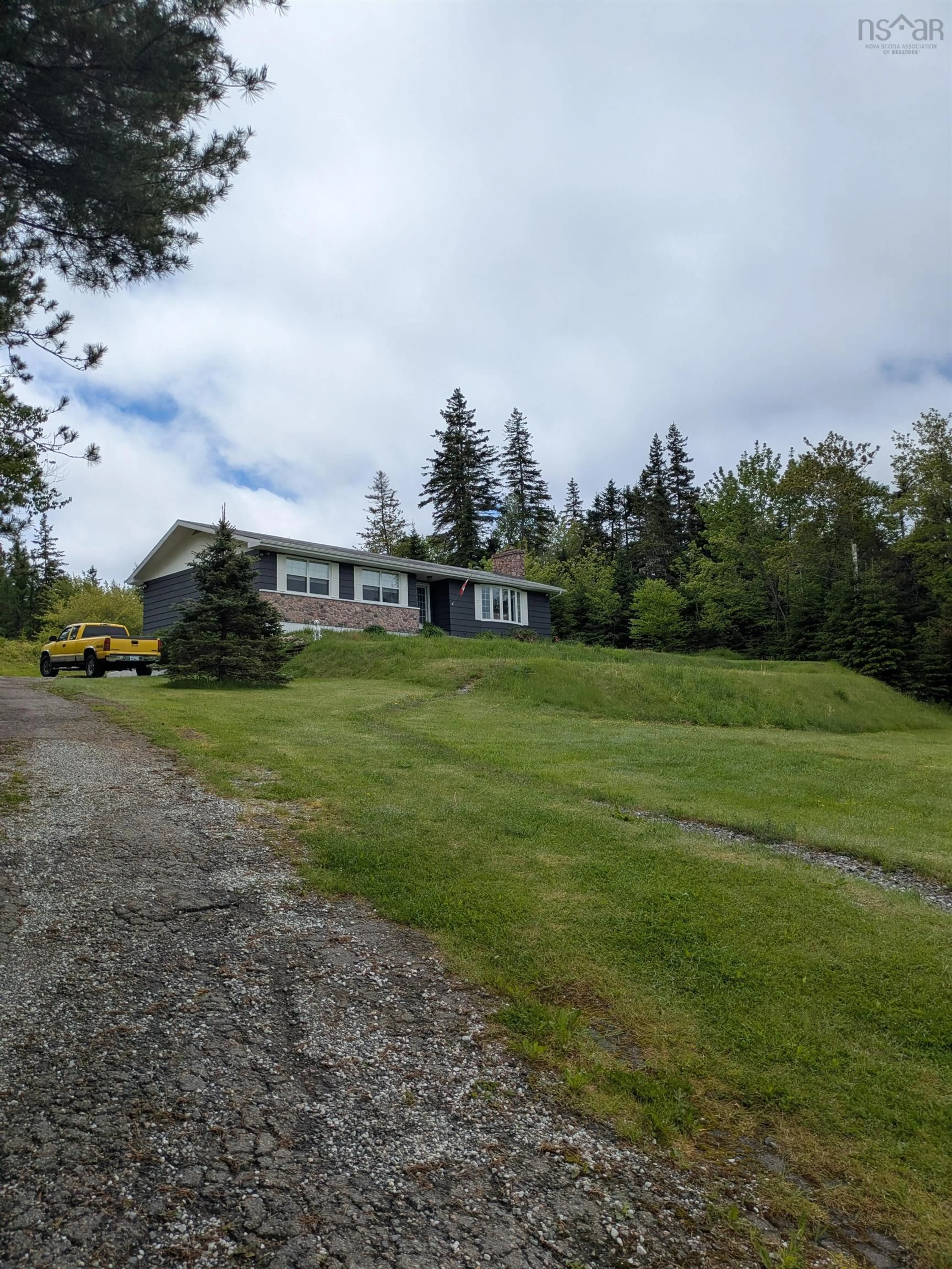 A pic from outside/outdoor area/front of a property/back of a property/a pic from drone, mountain view for 274 Trout Brook Road, Marion Bridge Nova Scotia B1K 2G2