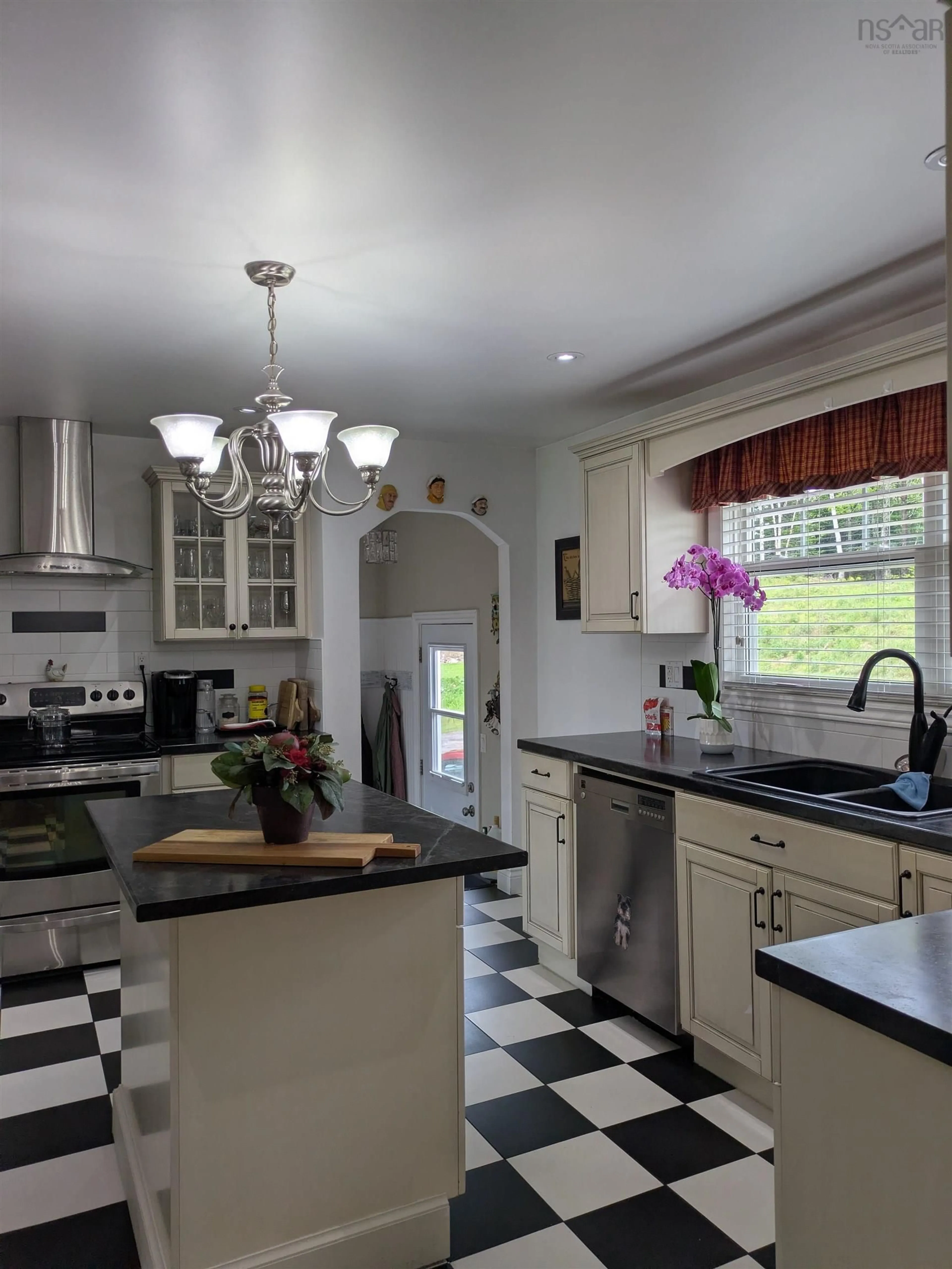 Open concept kitchen, ceramic/tile floor for 274 Trout Brook Road, Marion Bridge Nova Scotia B1K 2G2