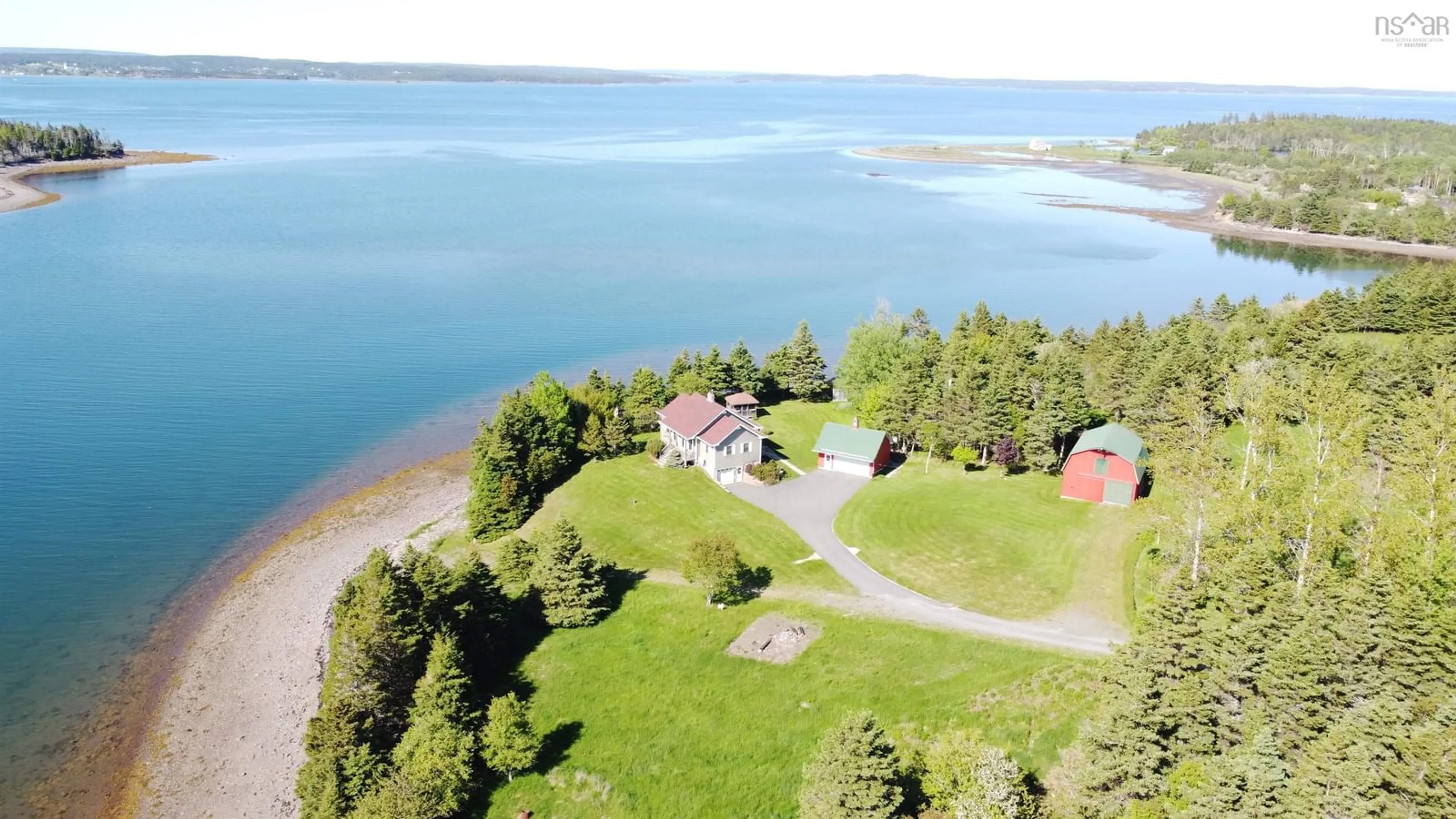 A pic from outside/outdoor area/front of a property/back of a property/a pic from drone, water/lake/river/ocean view for 11 Cap La Ronde, D'Escousse Nova Scotia B0E 1K0