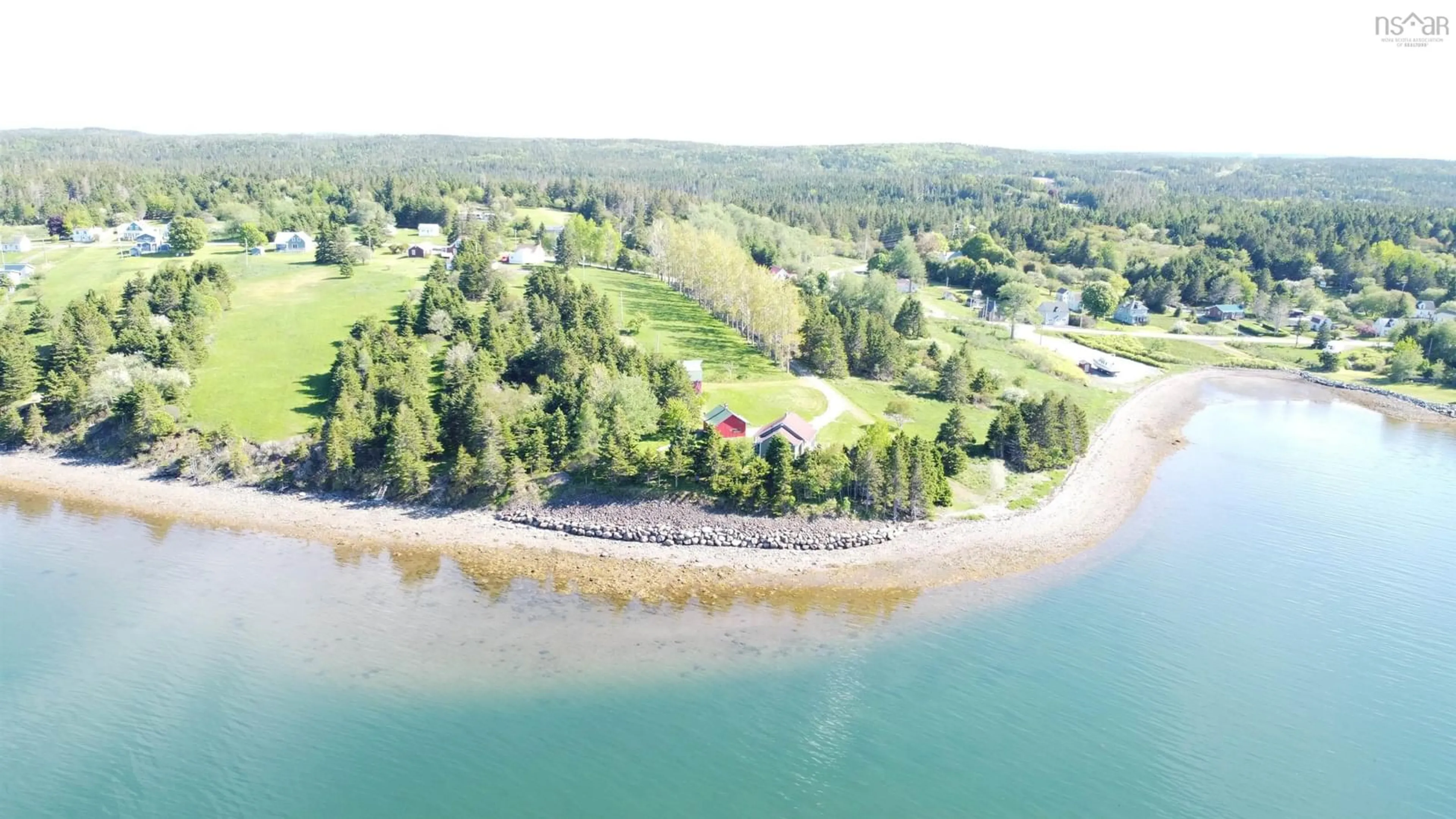 A pic from outside/outdoor area/front of a property/back of a property/a pic from drone, water/lake/river/ocean view for 11 Cap La Ronde, D'Escousse Nova Scotia B0E 1K0