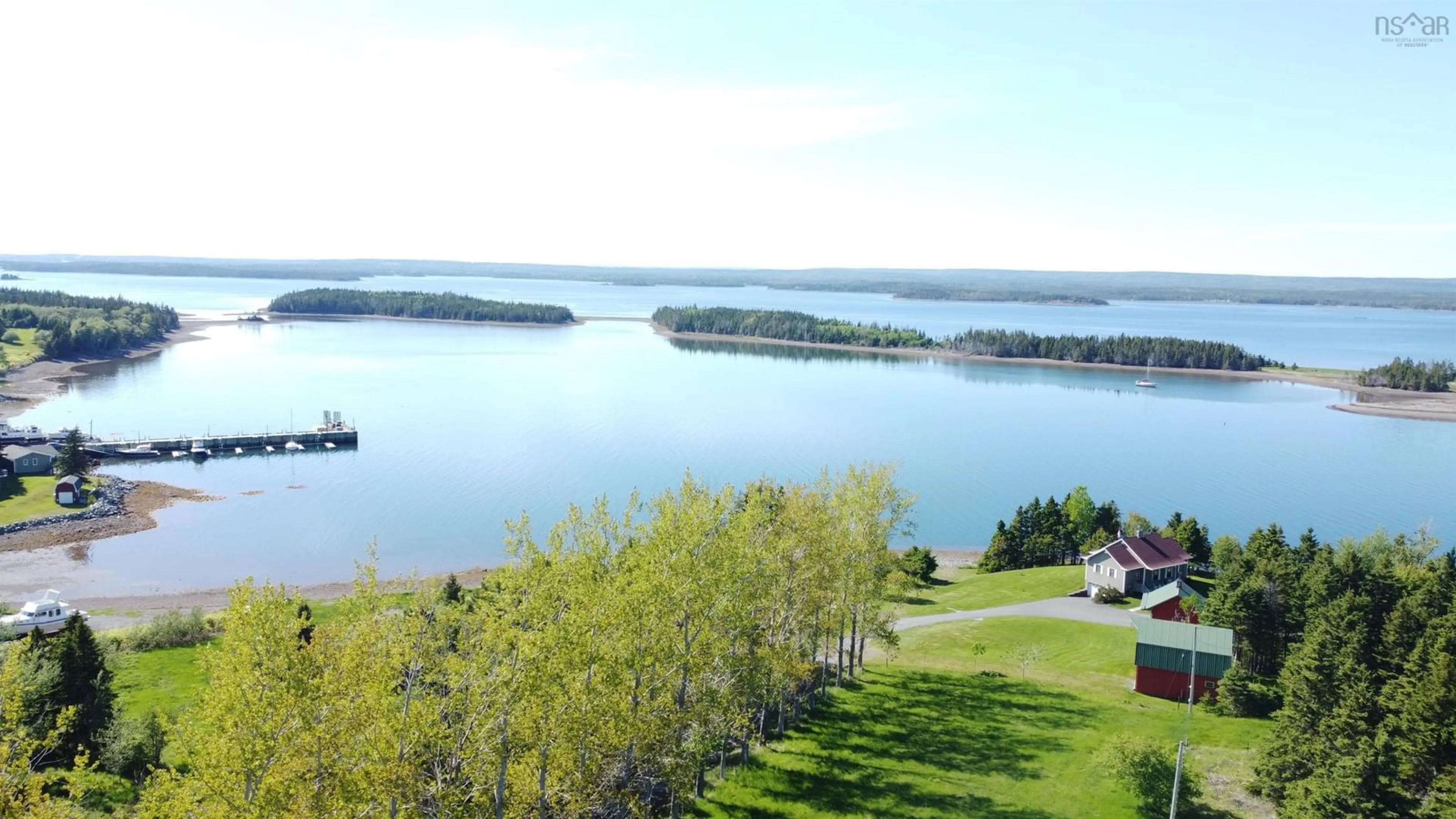 A pic from outside/outdoor area/front of a property/back of a property/a pic from drone, water/lake/river/ocean view for 11 Cap La Ronde, D'Escousse Nova Scotia B0E 1K0