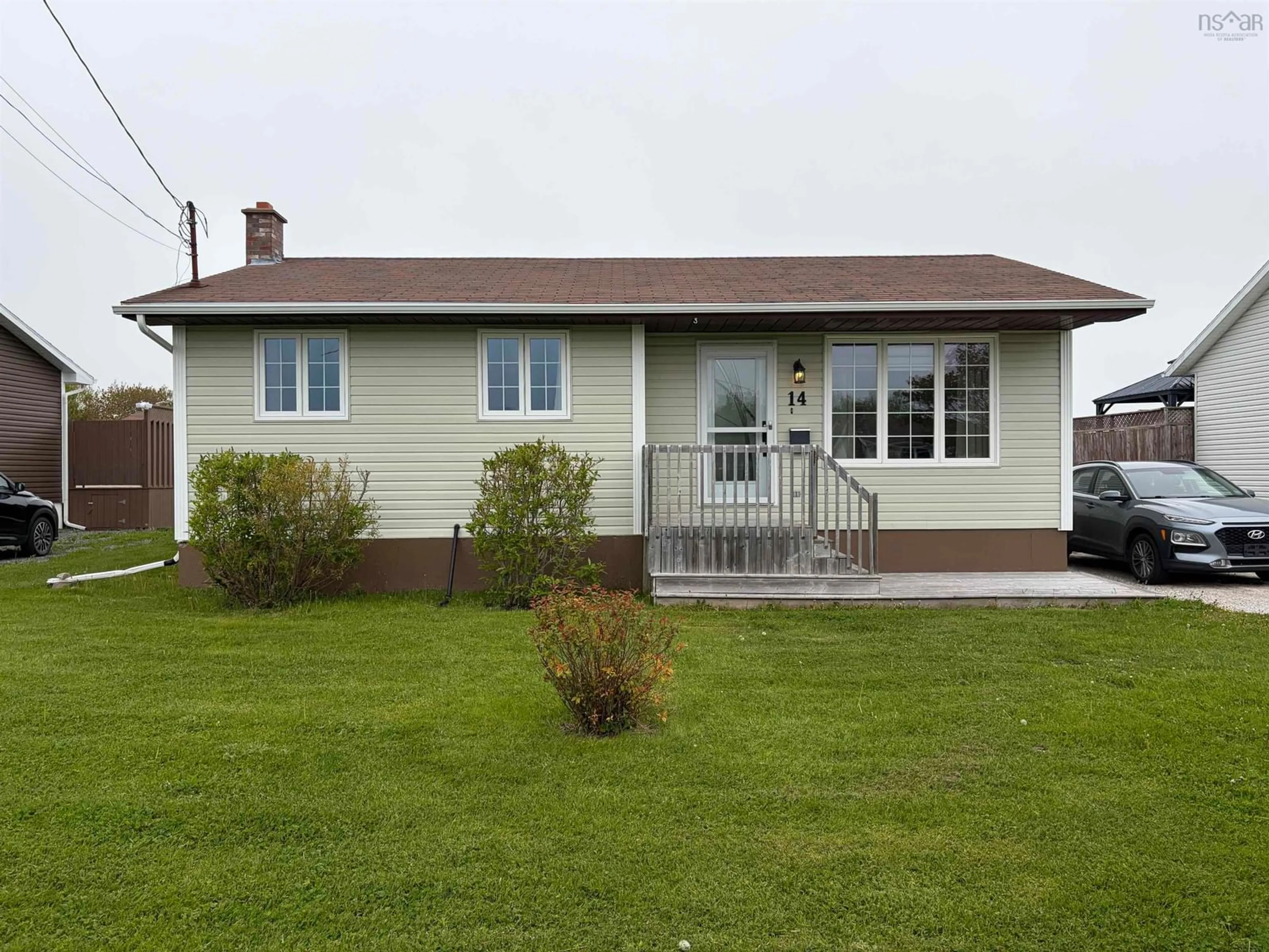 Home with vinyl exterior material, street for 14 Drew St, Glace Bay Nova Scotia B1A 1A7