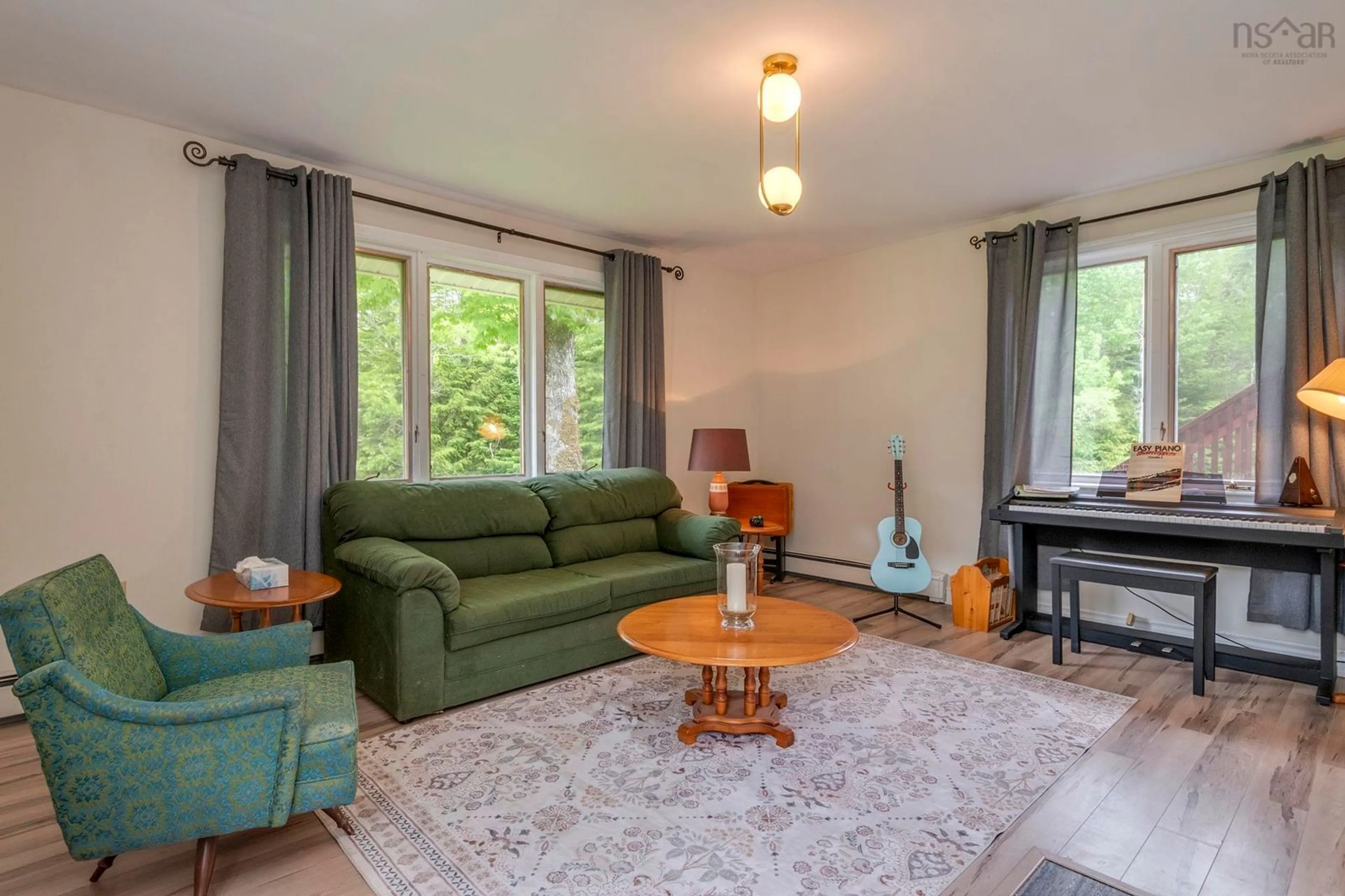 Living room with furniture, unknown for East River East Side Rd #3268, Churchville Nova Scotia B2H 5C5