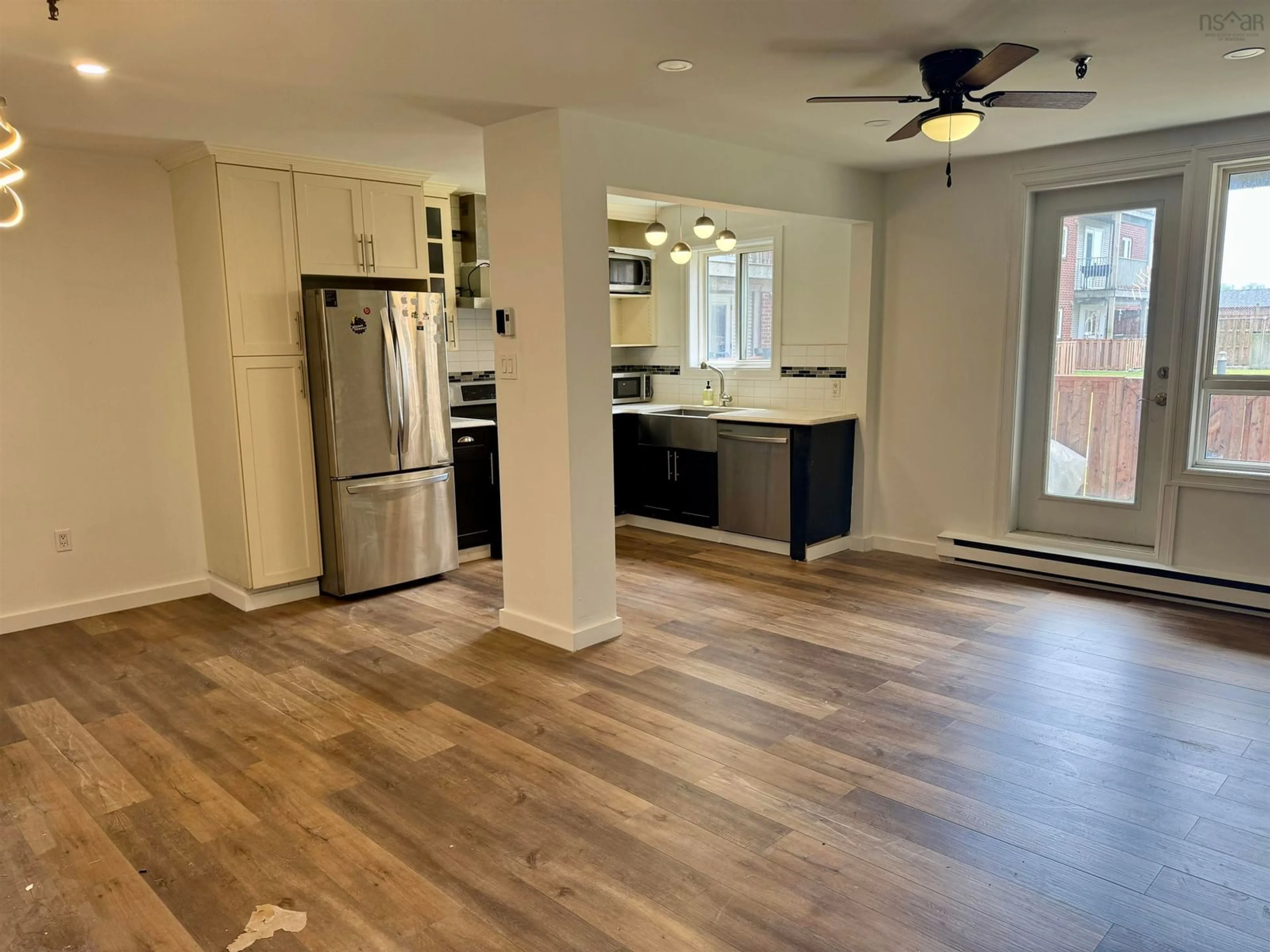 Open concept kitchen, wood/laminate floor for 281 Windmill Rd #112, Dartmouth Nova Scotia B3A 4P9