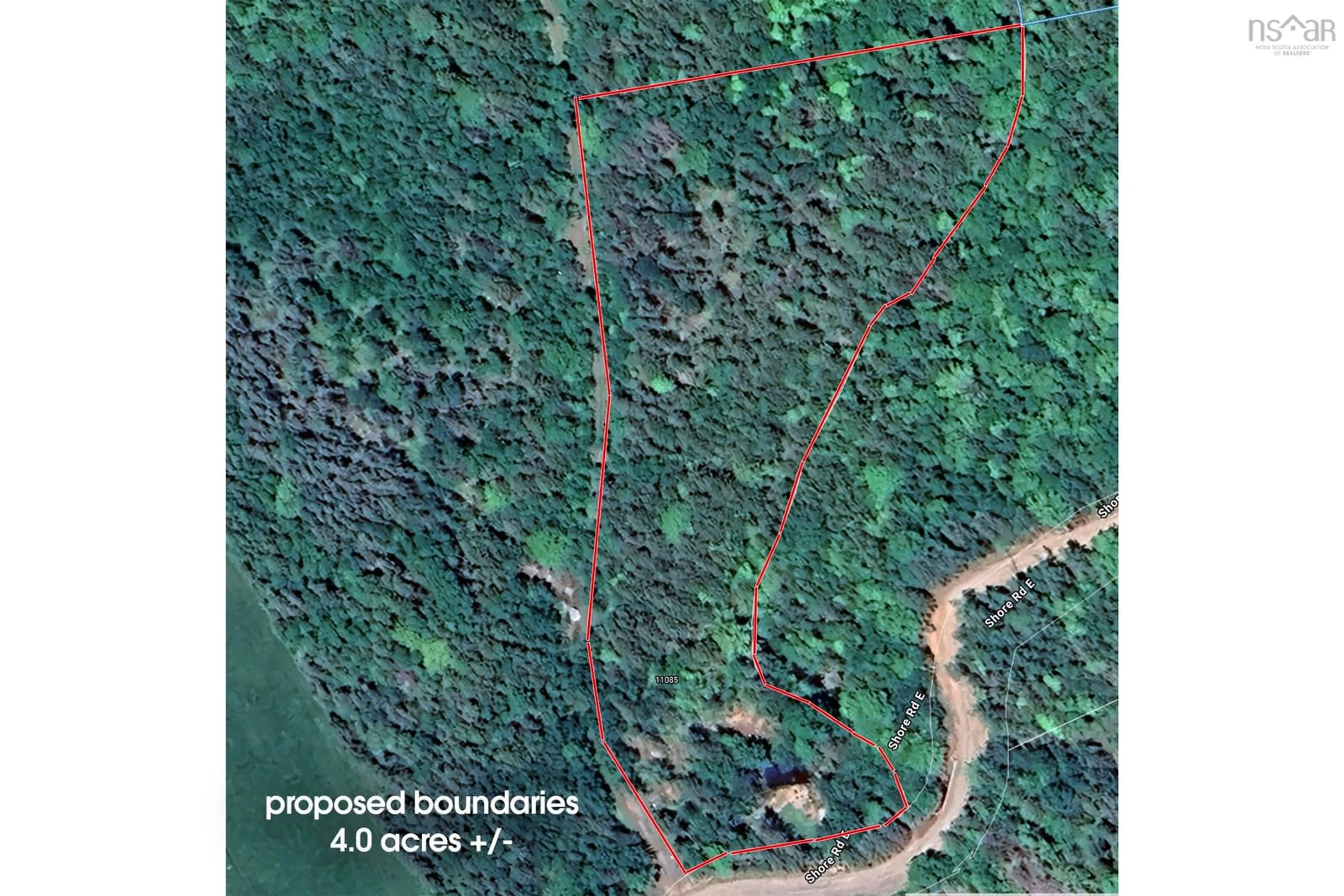A pic from outside/outdoor area/front of a property/back of a property/a pic from drone, forest/trees view for 11085 Shore Rd, Outram Nova Scotia B0S 1P0