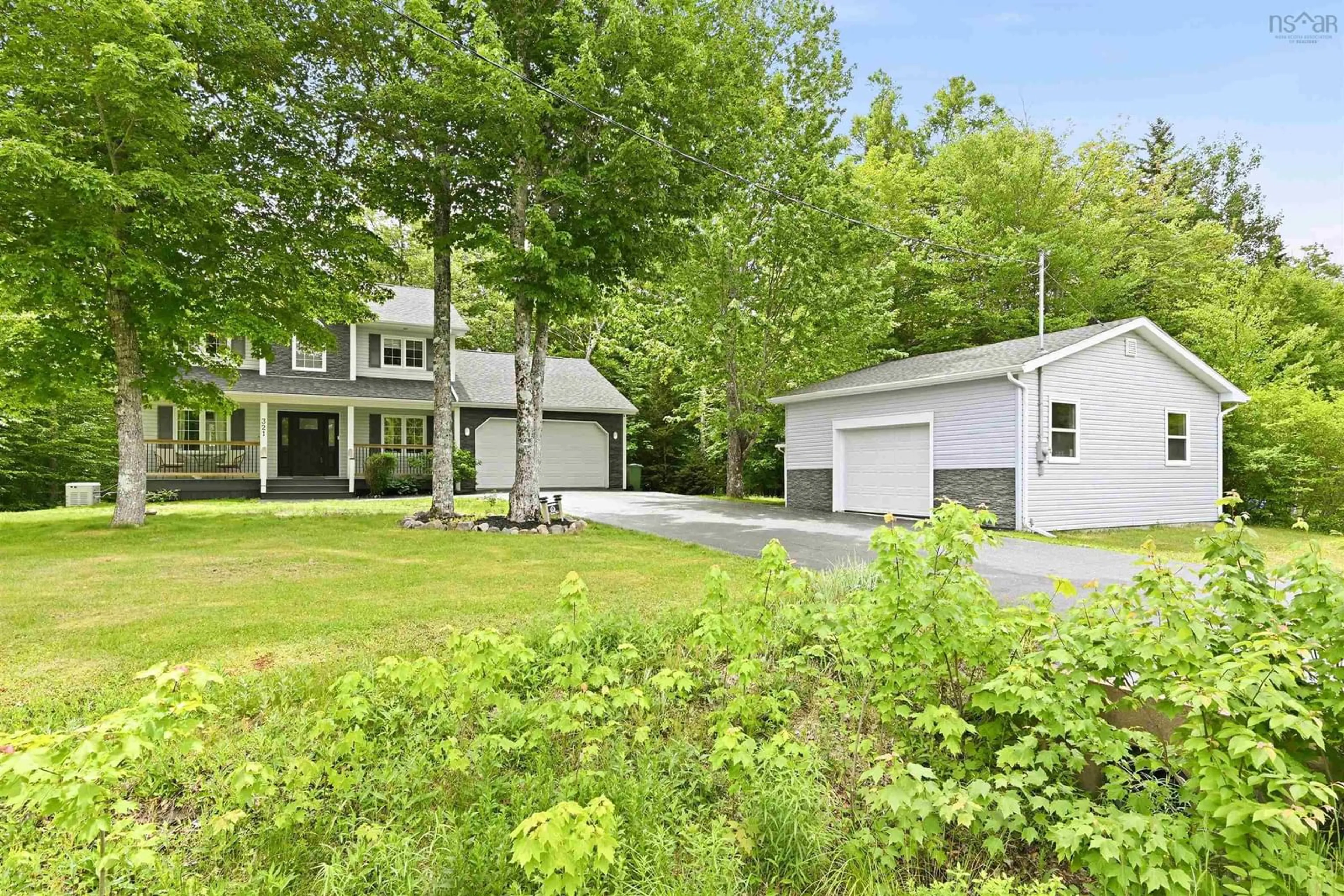 A pic from outside/outdoor area/front of a property/back of a property/a pic from drone, street for 321 Norman Blvd, Hammonds Plains Nova Scotia B4B 1W3