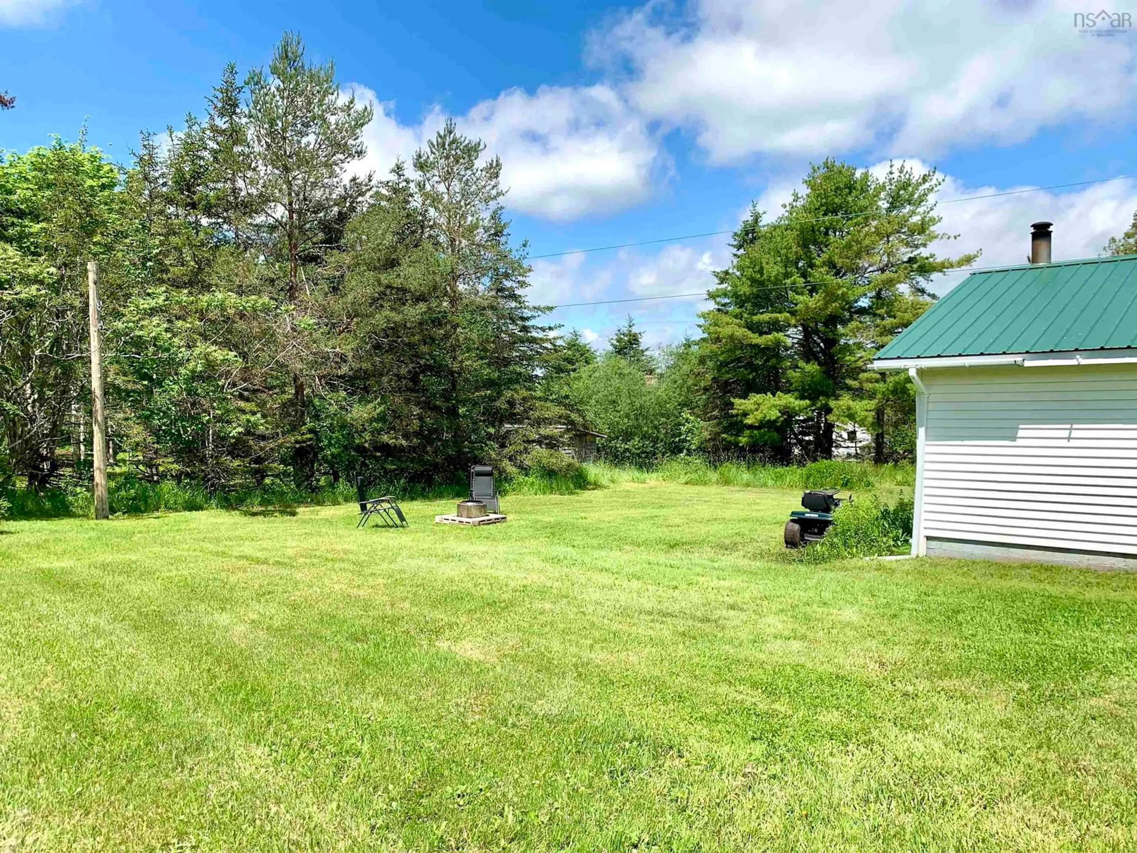 A pic from outside/outdoor area/front of a property/back of a property/a pic from drone, forest/trees view for 82 Wolsley St, Springhill Nova Scotia B0M 1X0