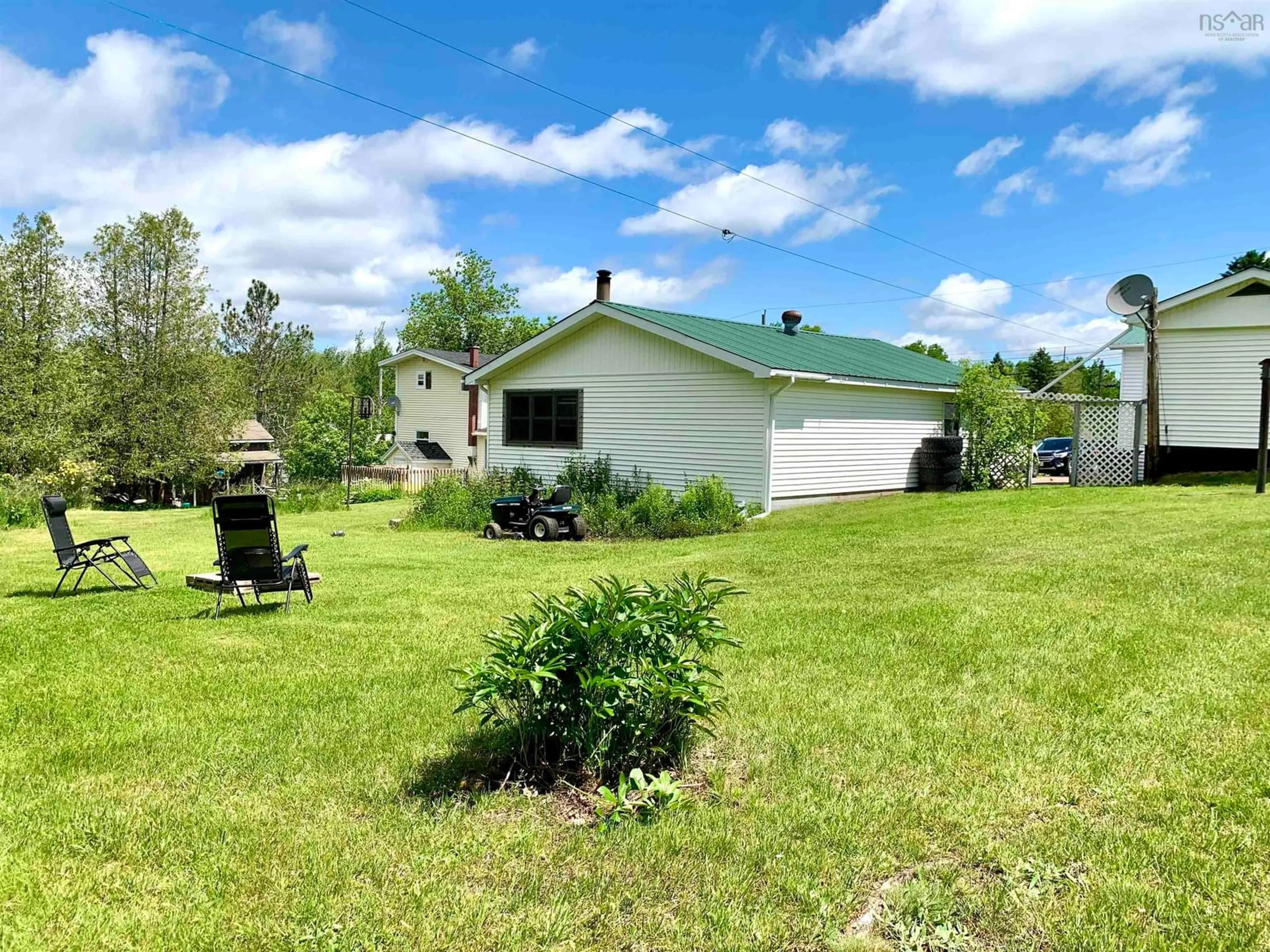 A pic from outside/outdoor area/front of a property/back of a property/a pic from drone, water/lake/river/ocean view for 82 Wolsley St, Springhill Nova Scotia B0M 1X0